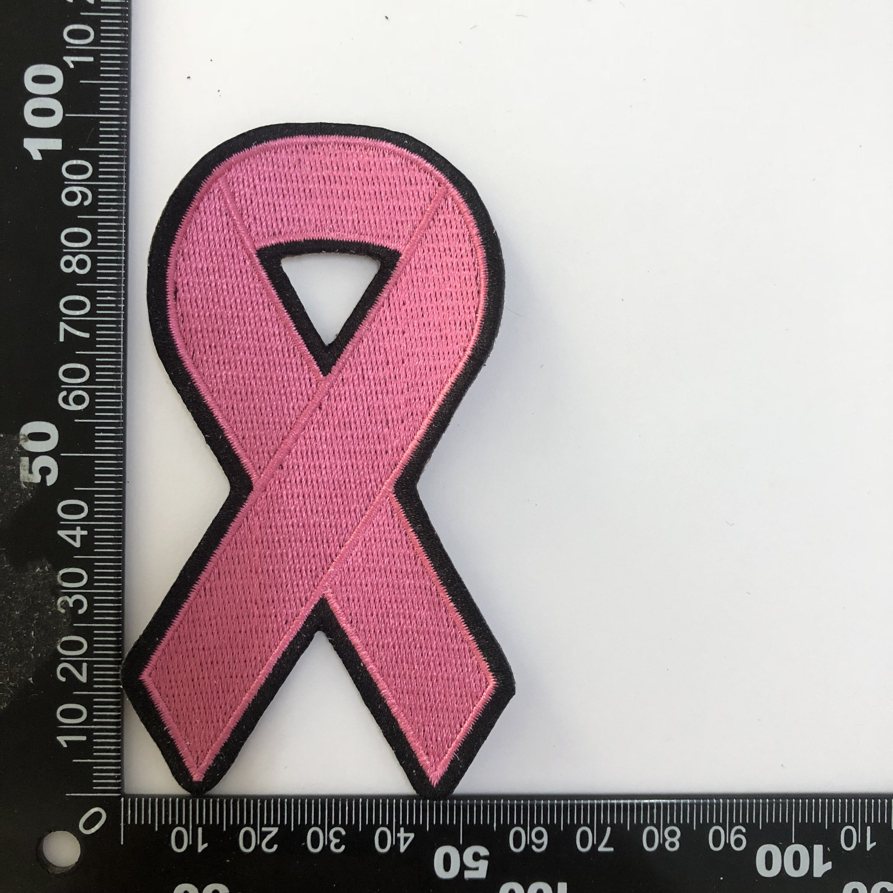Pink ribbon awareness patch with ruler