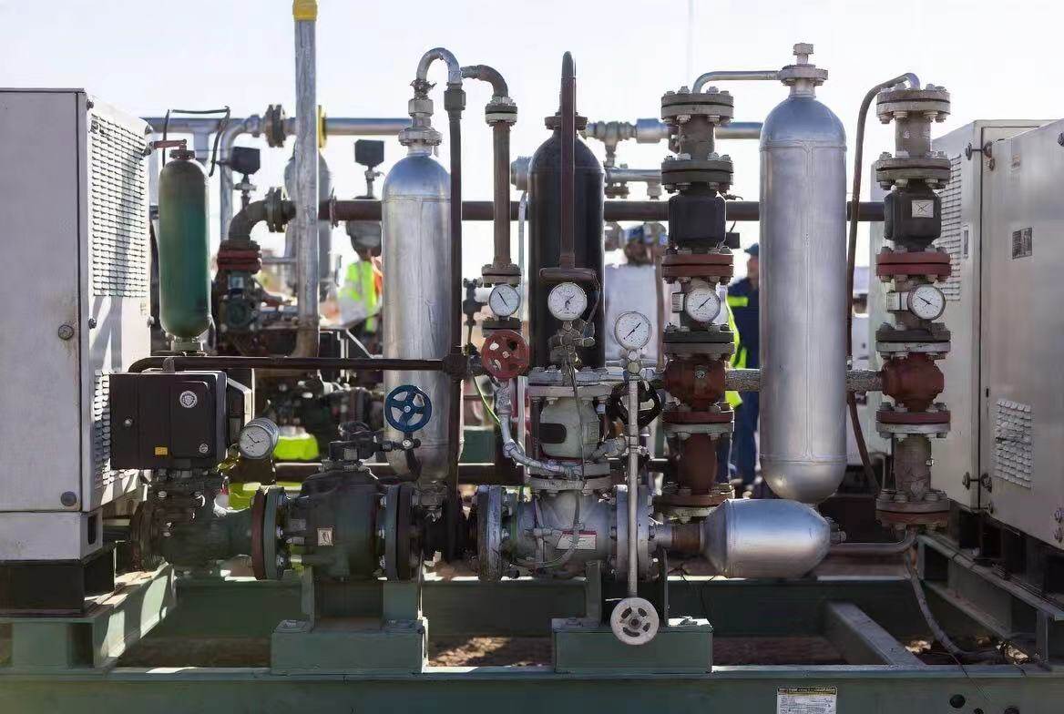 Oilfield gas processing equipment with pipes and valves