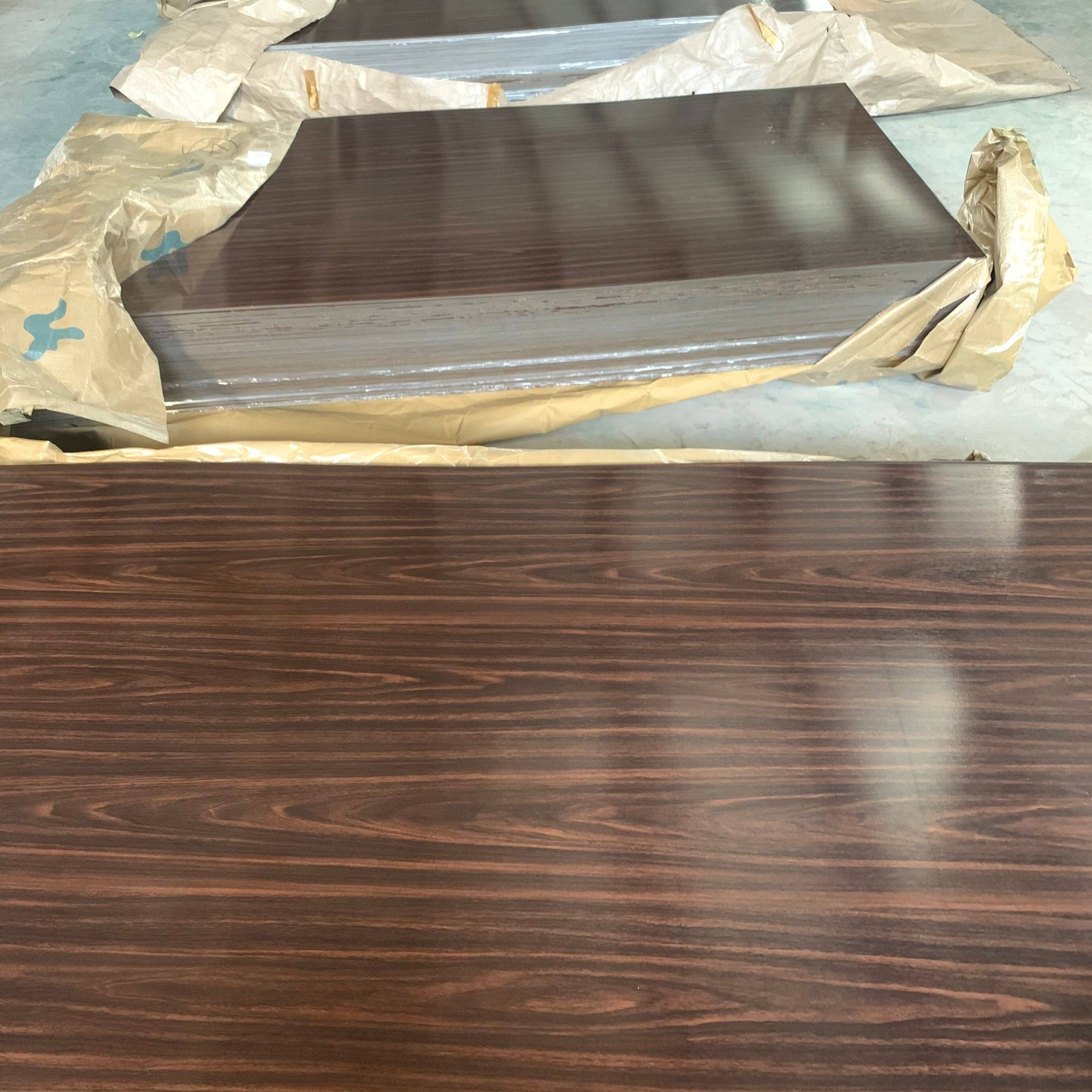 Rosewood-patterned film-coated steel sheet