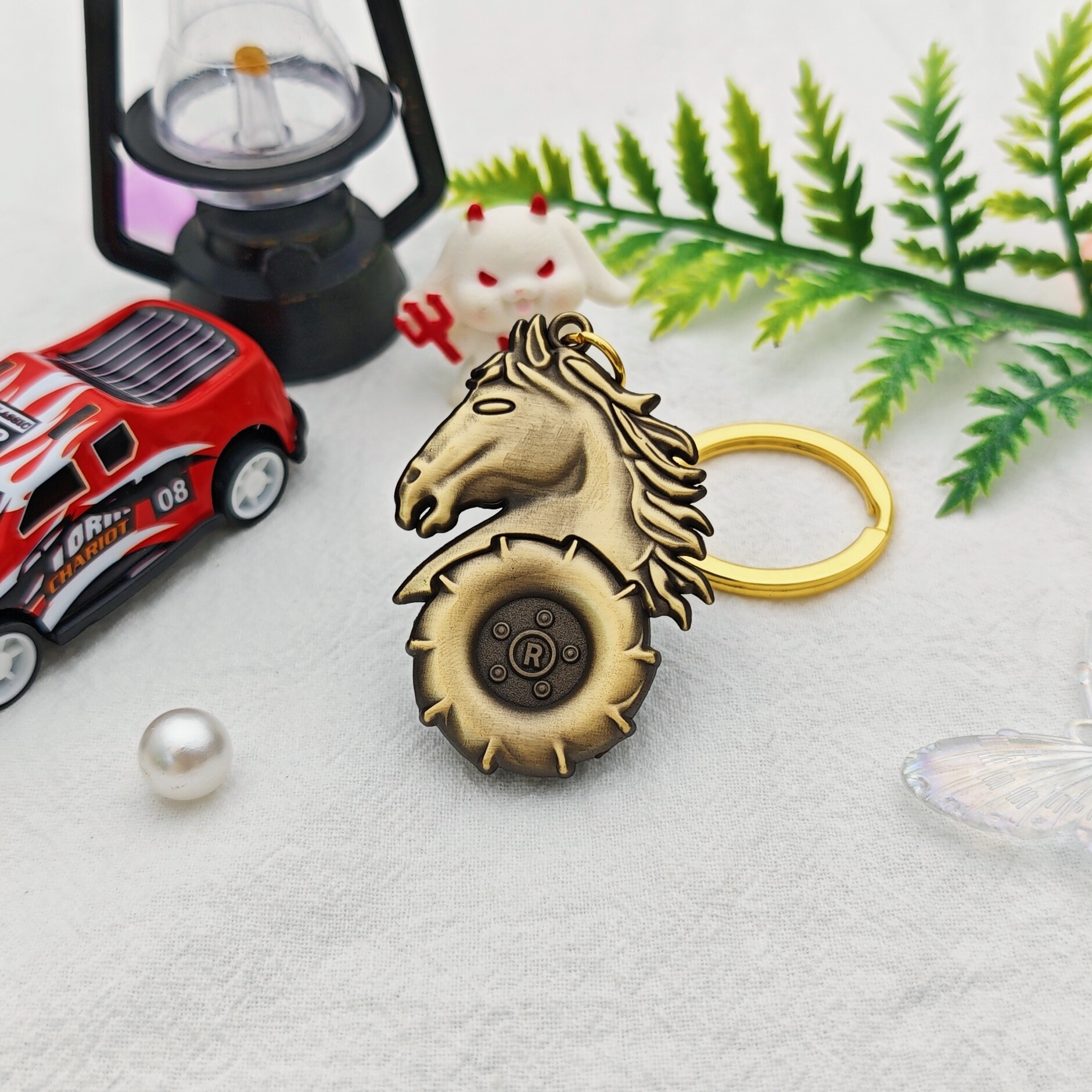 Wheel Horse: Embossed Tire & Vintage Gold Keychain