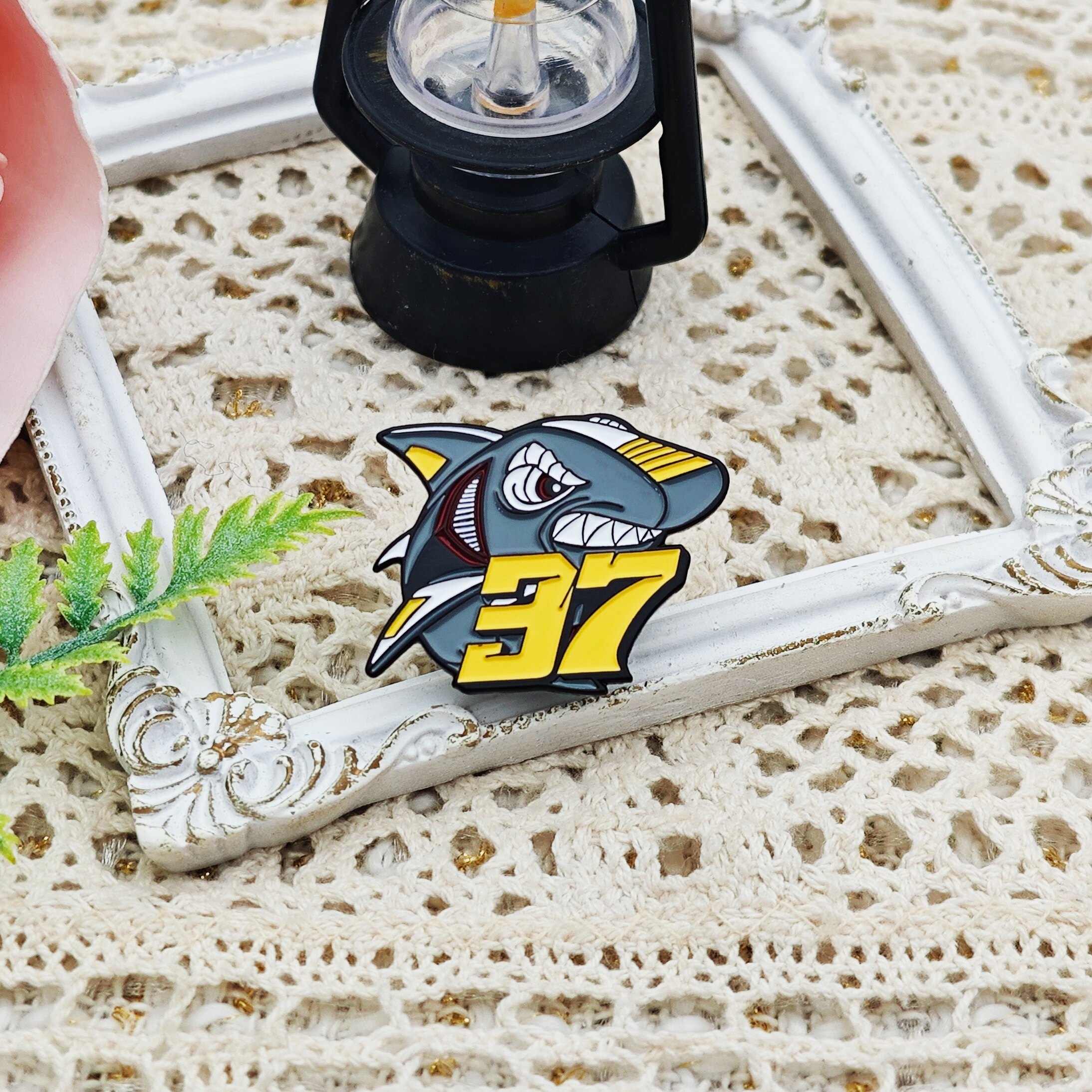 Spanish cartoon shark number 37 black powder-coated custom-shaped badge