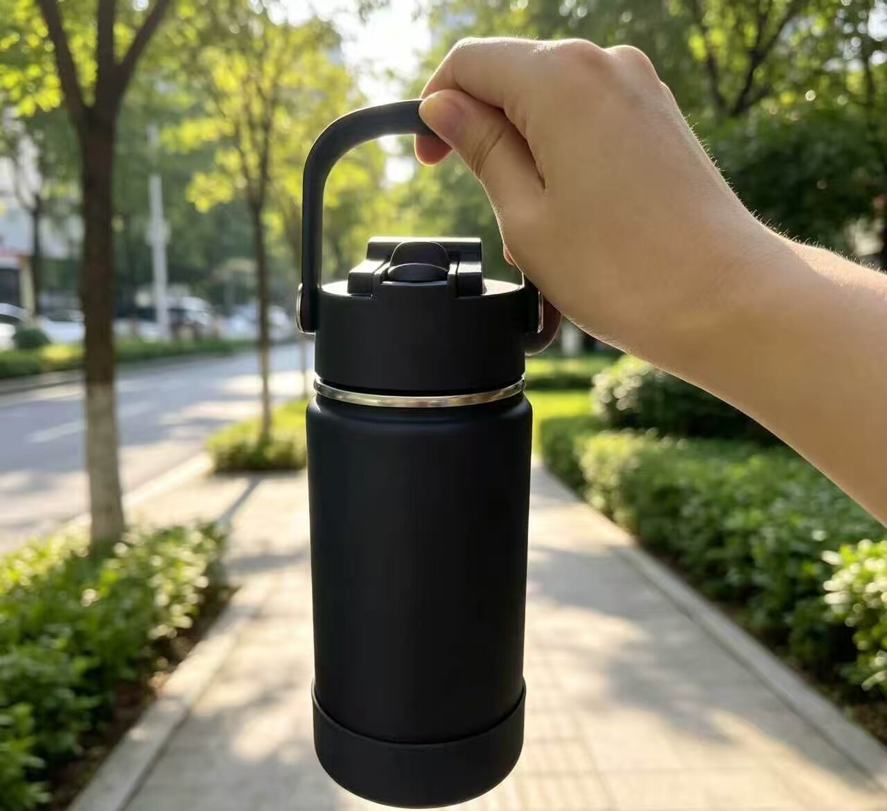 Sleek Matte Black Pop-Up Travel Thermos 3