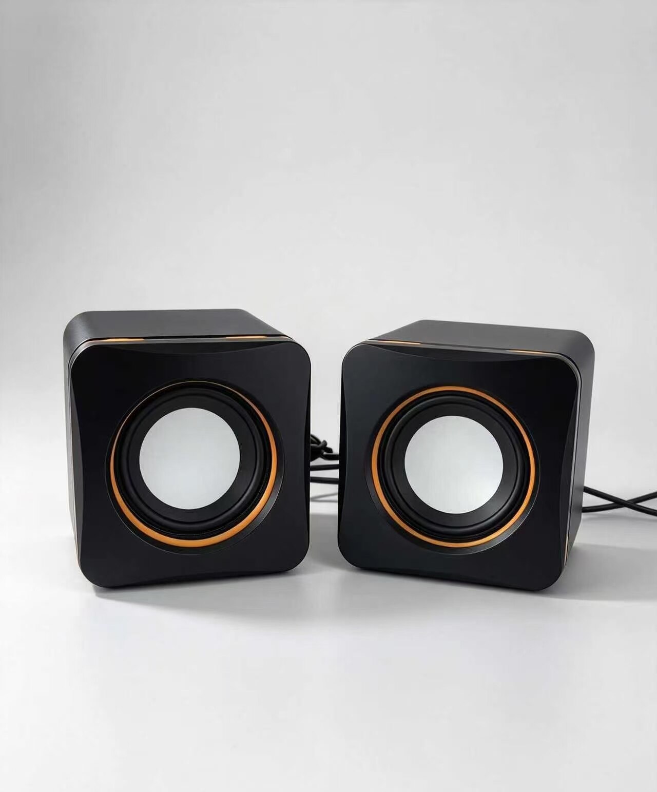 Black Armor with Orange Ring Desktop Speaker