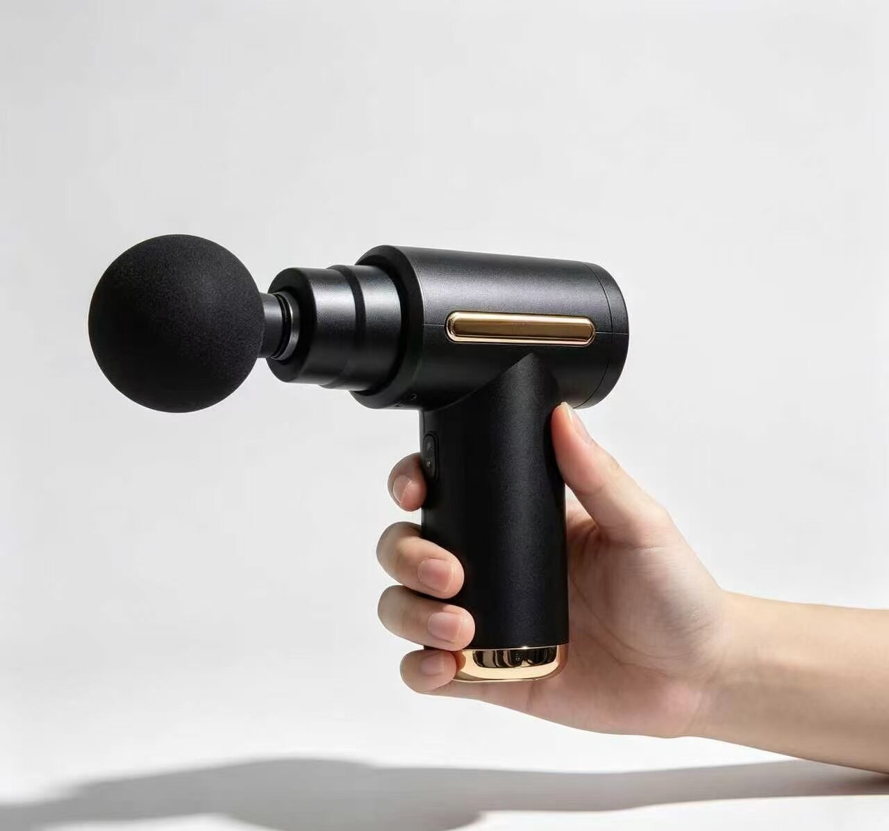 Black & Gold Portable Massage Gun 4