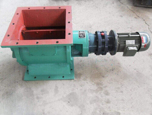 Star rotary airlock discharger with green painted body, square inlet flange and cycloid gearmotor drive
