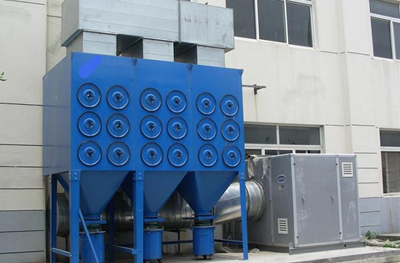 Blue cartridge dust collector with round access covers and cone hoppers