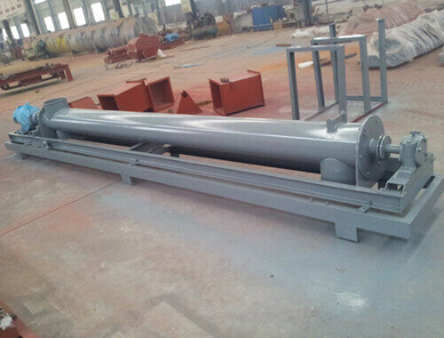 Tubular screw conveyor with gear motor drive finished in the factory yard