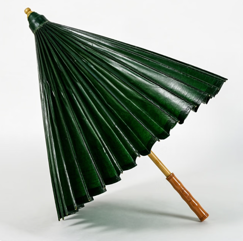 Intangible Cultural Heritage Handmade Tung Oil Paper Umbrella
Ancient dyeing craft, green canopy. Ancient style, suitable for rain and sun protection. 6