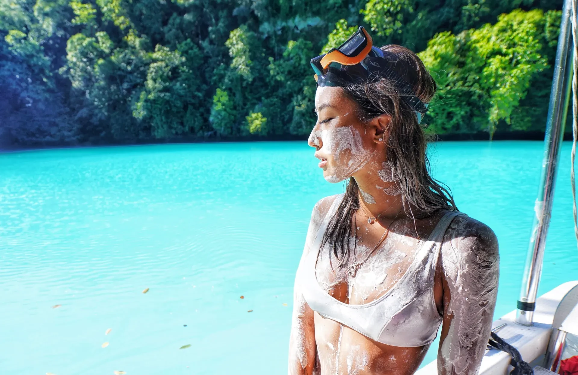 Snorkeling scene: resting by clear waters while wearing COCAS snorkel mask and tube.