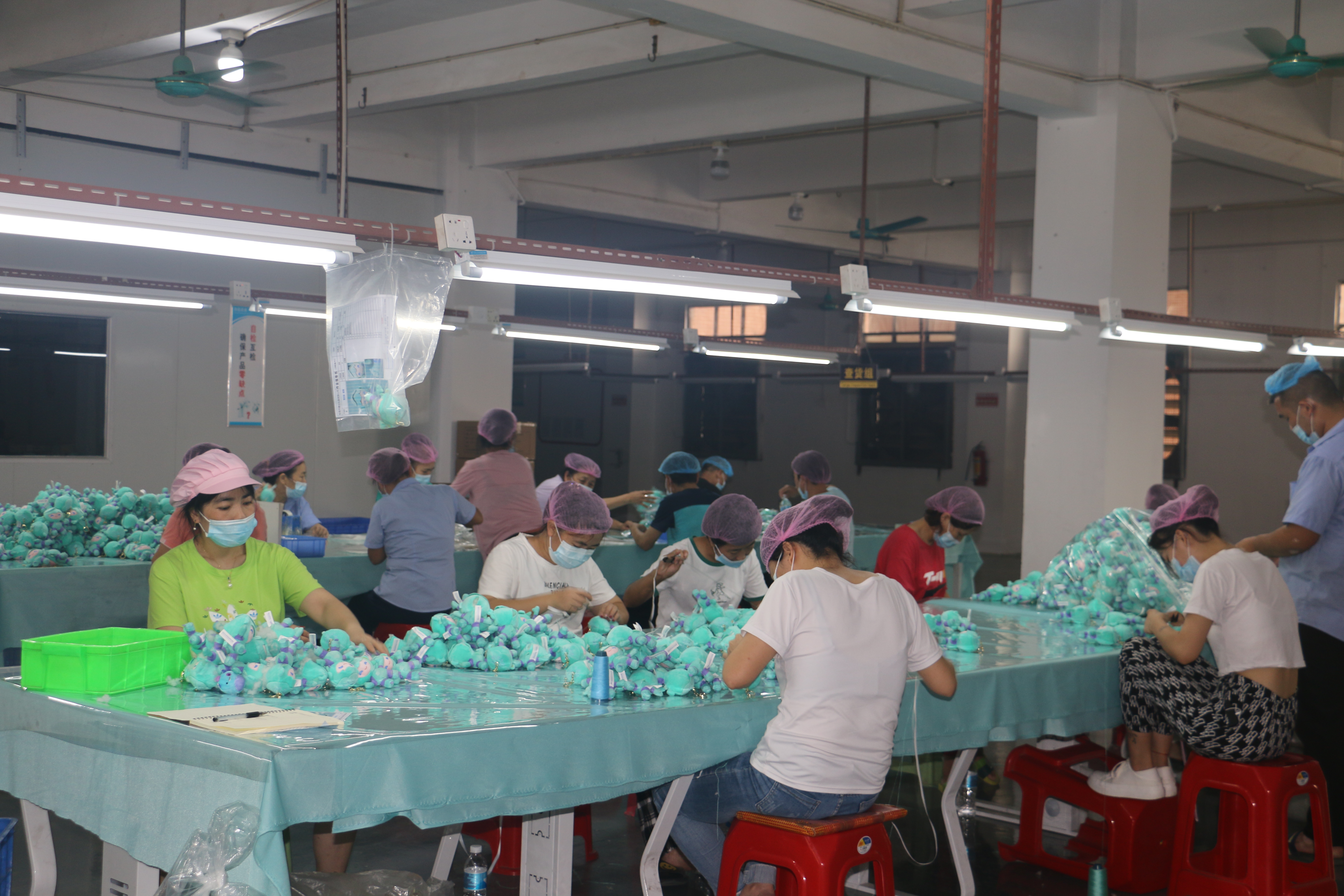 Eenbei production team hand-sewing plush toys