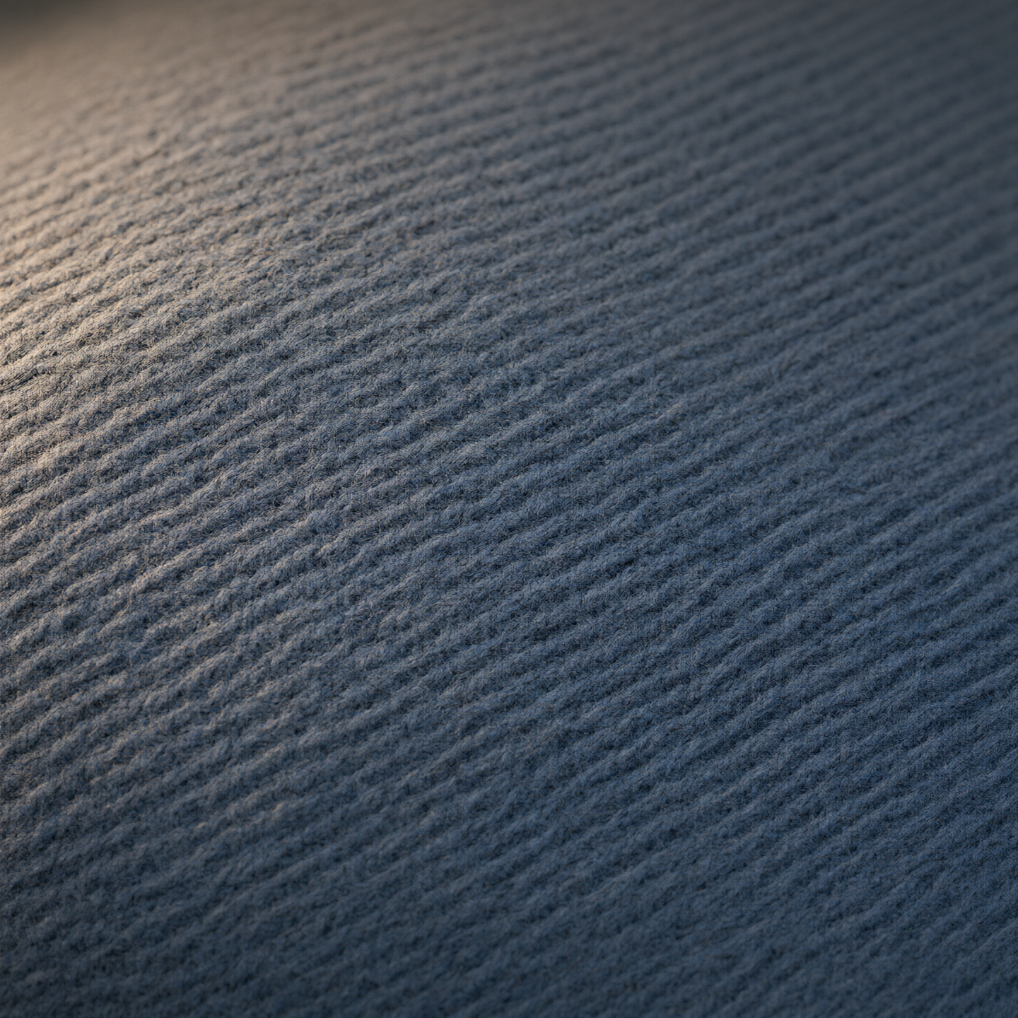 Extreme close-up of Indigo Mist wool-blend twill fabric showing tonal variations