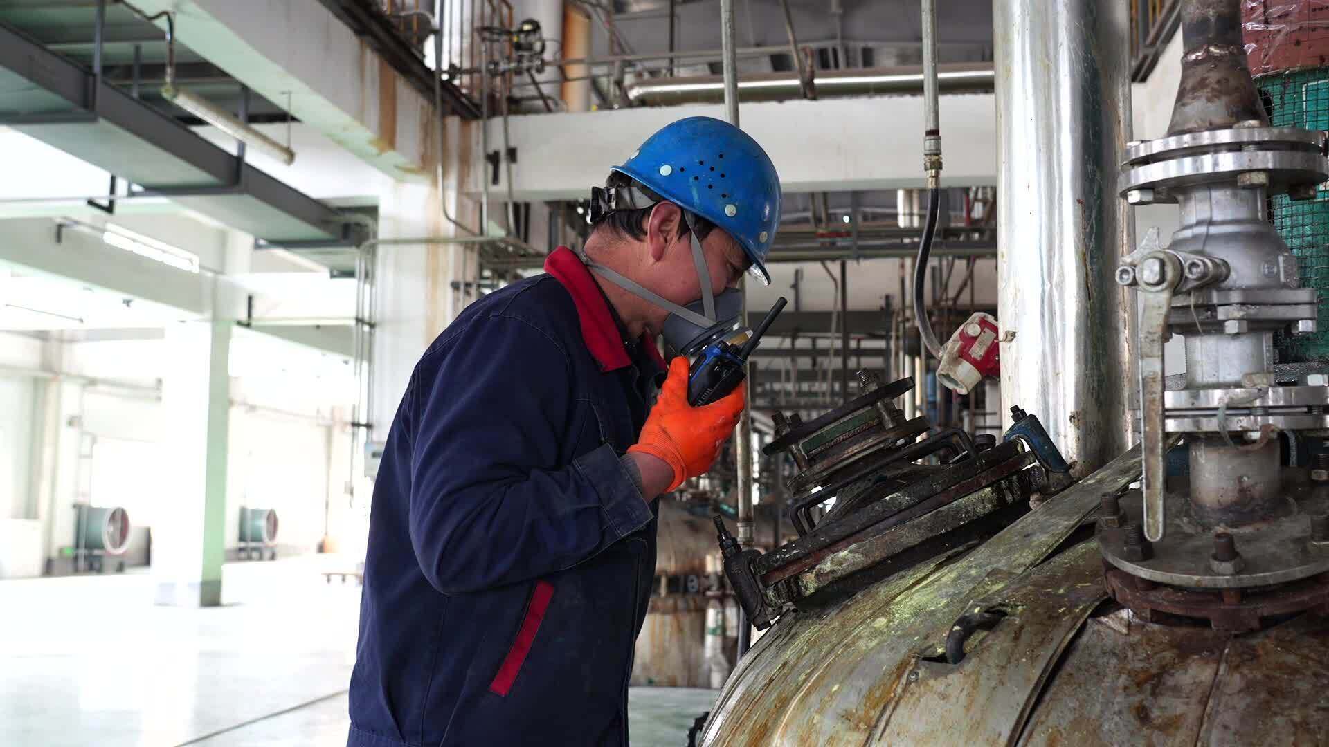 Worker Operating Equipment