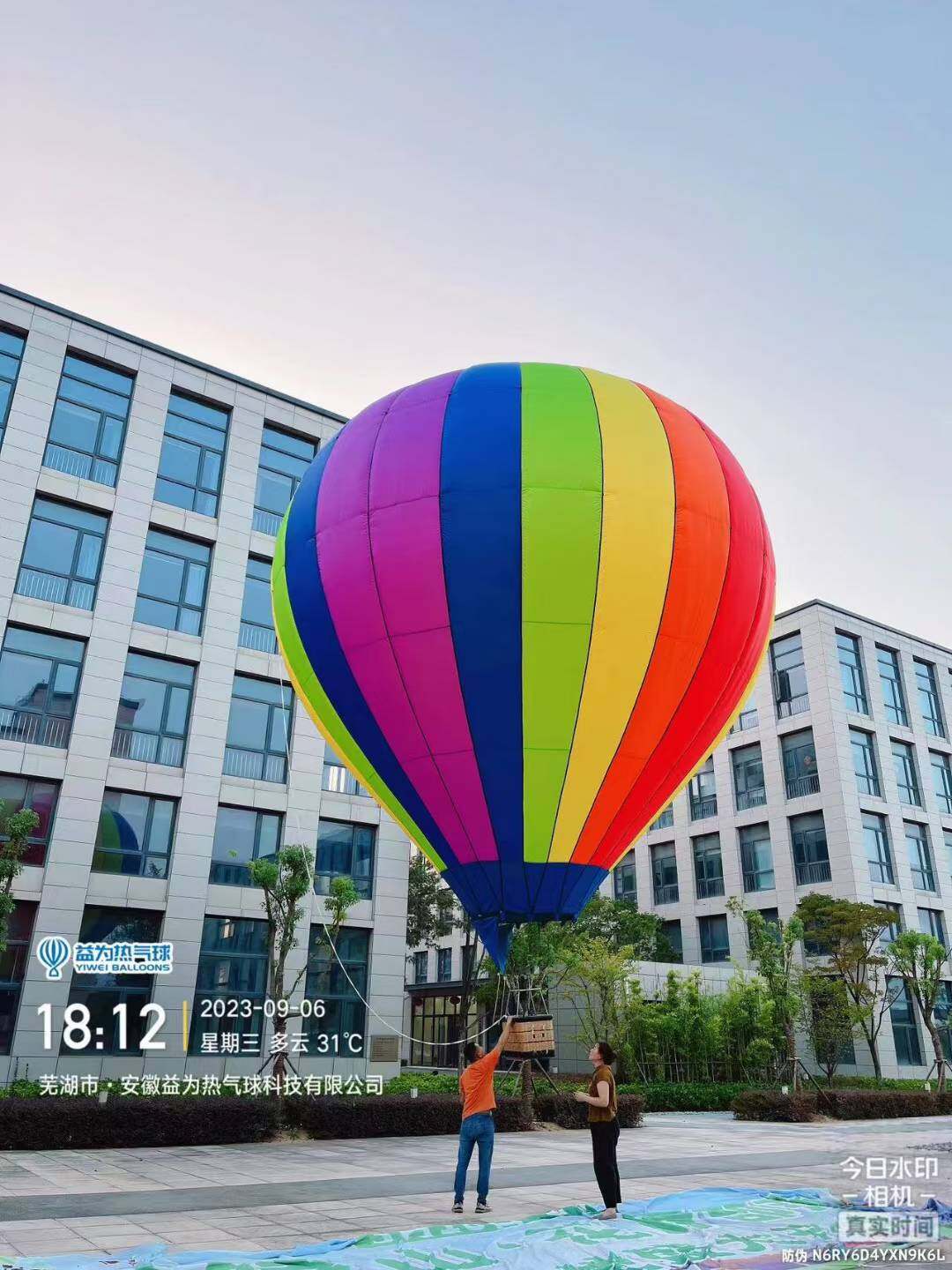 Rainbow Vertical-Striped Remote-Controlled Hot Air Balloon – Features a vibrant multi-color vertical stripe design in purple, blue, green, yellow, orange, and red. Classic styling with eye-catching colors; ideal for scenic tours, commercial events, and outdoor displays.