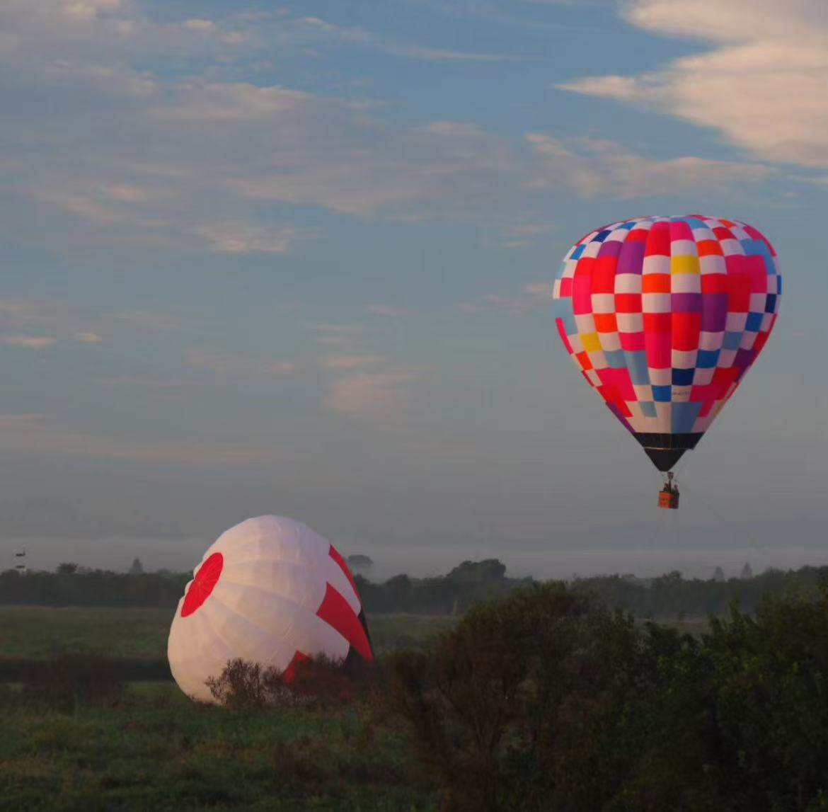 African Savanna Hot Air Balloon – Colorful checkered design for savanna sightseeing flights.