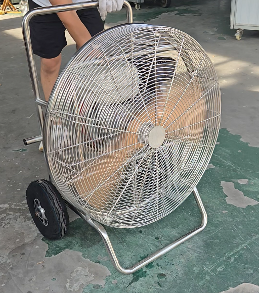Inflation Fan Close-up - Protective Metal Grille Yiwei Balloons inflation fan close-up view - large circular fan with protective metal grille and wheels for mobility