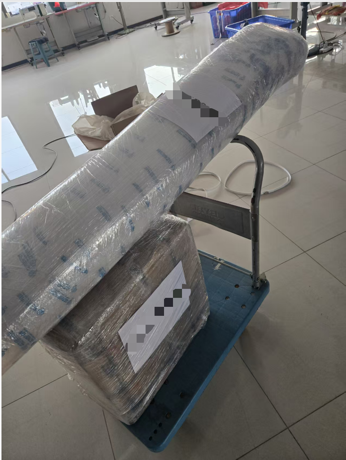 Hot Air Balloon Fabric and Accessories on Hand Truck Yiwei Balloons hot air balloon fabric roll and accessories on hand truck - wrapped packages ready for shipping to Middle East