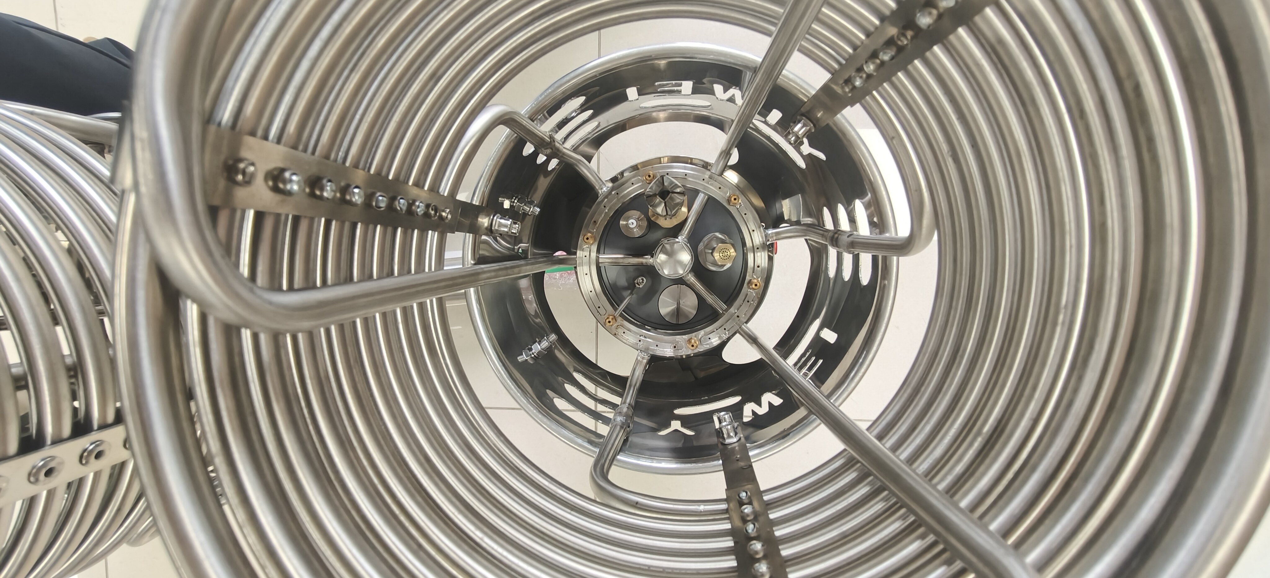 Hot Air Balloon Burner Internal Coil Structure Yiwei Balloons hot air balloon burner internal stainless steel vaporizing coil structure with precision welding close-up view