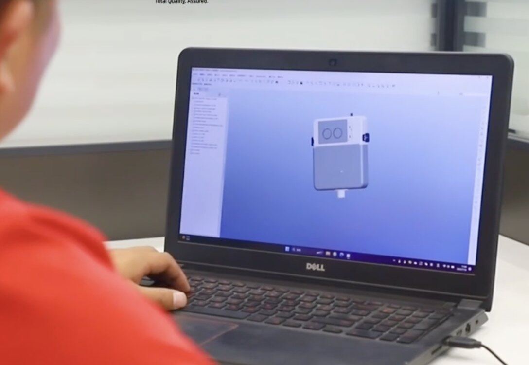 Engineer reviewing CAD design