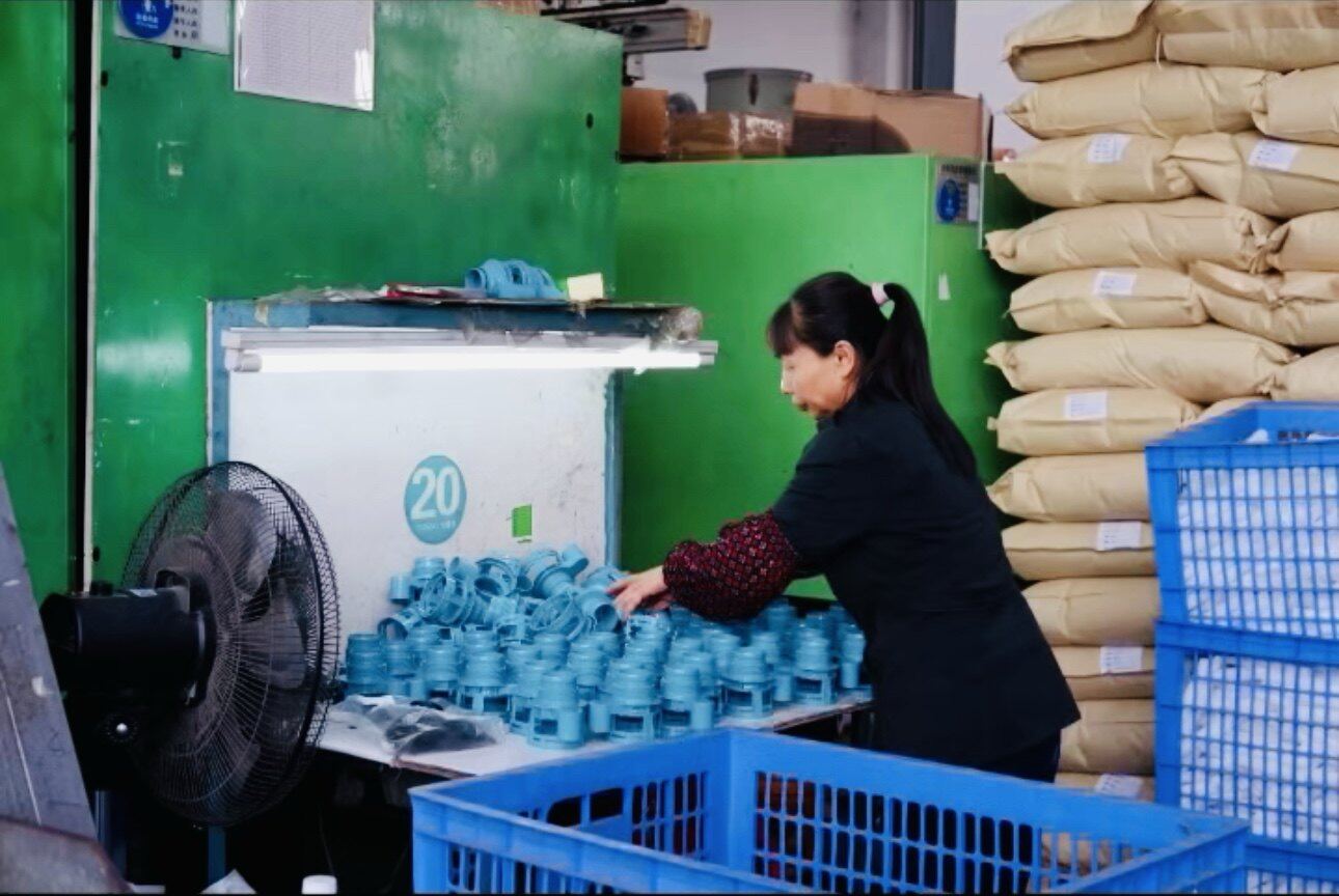 Worker operating testing equipment