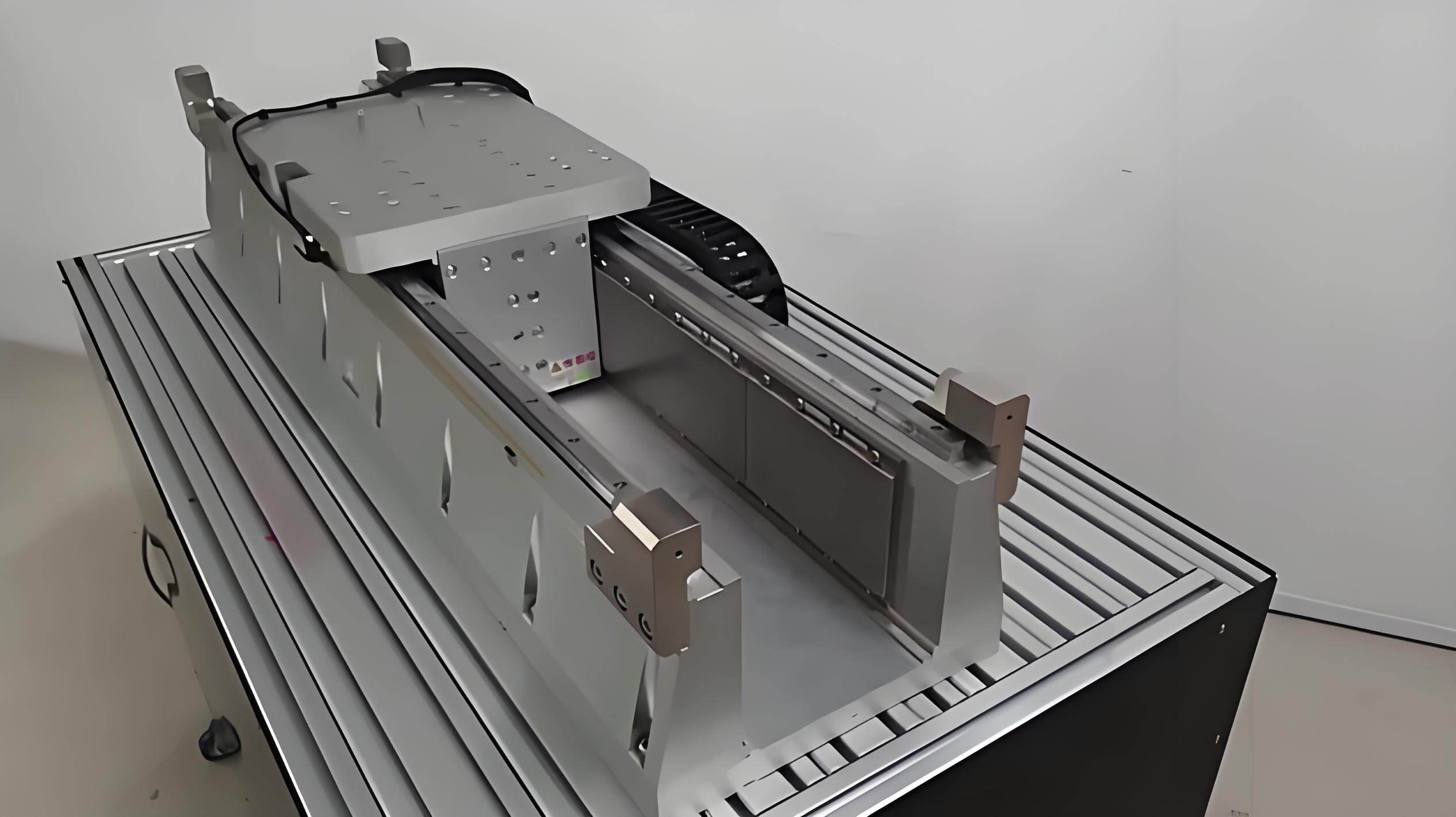 Iron-core U-shaped (double-sided) linear motor: balancing high thrust with low disturbance through intelligent design