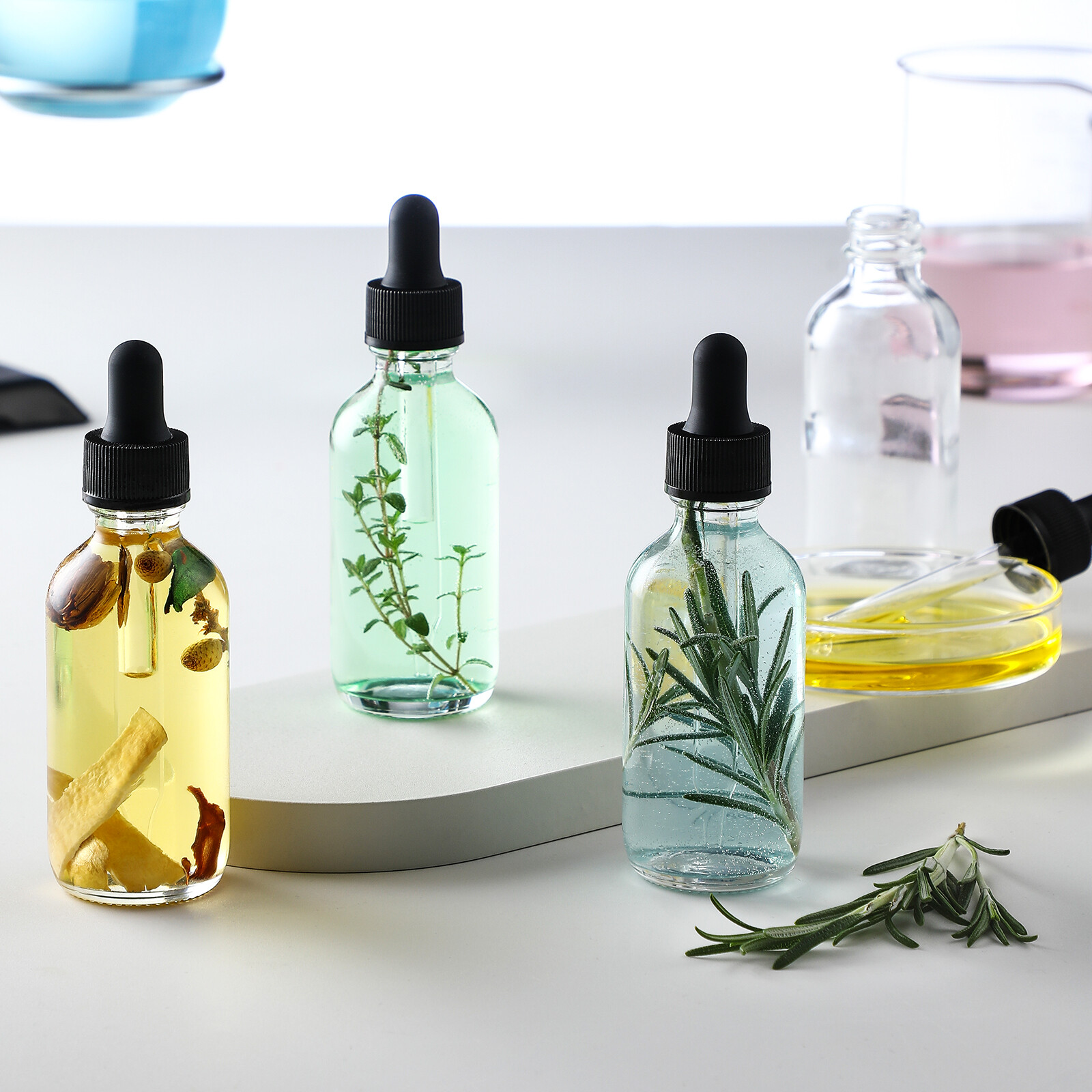 12 Pack, 2 oz Glass Eye Dropper Bottles w/ 3 Stainless Steel Funnels & 1 Long Pipette Dropper & 24 Labels - 60ml Clear Tincture Bottles for Essential Oils, Liquids - Leakproof Travel Essential Bottles view 8