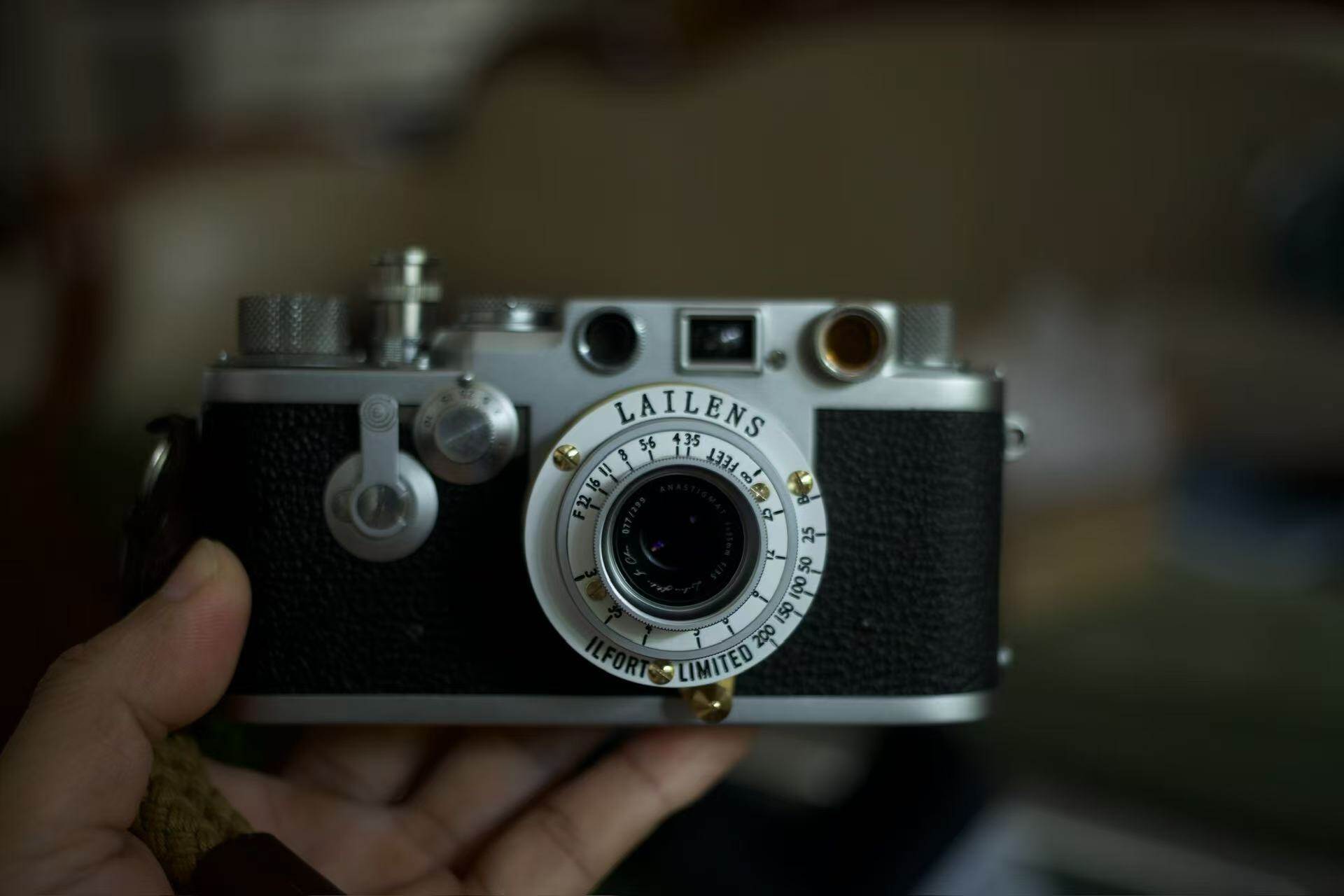 LAILENS Lens with Black Leica Top-Down View