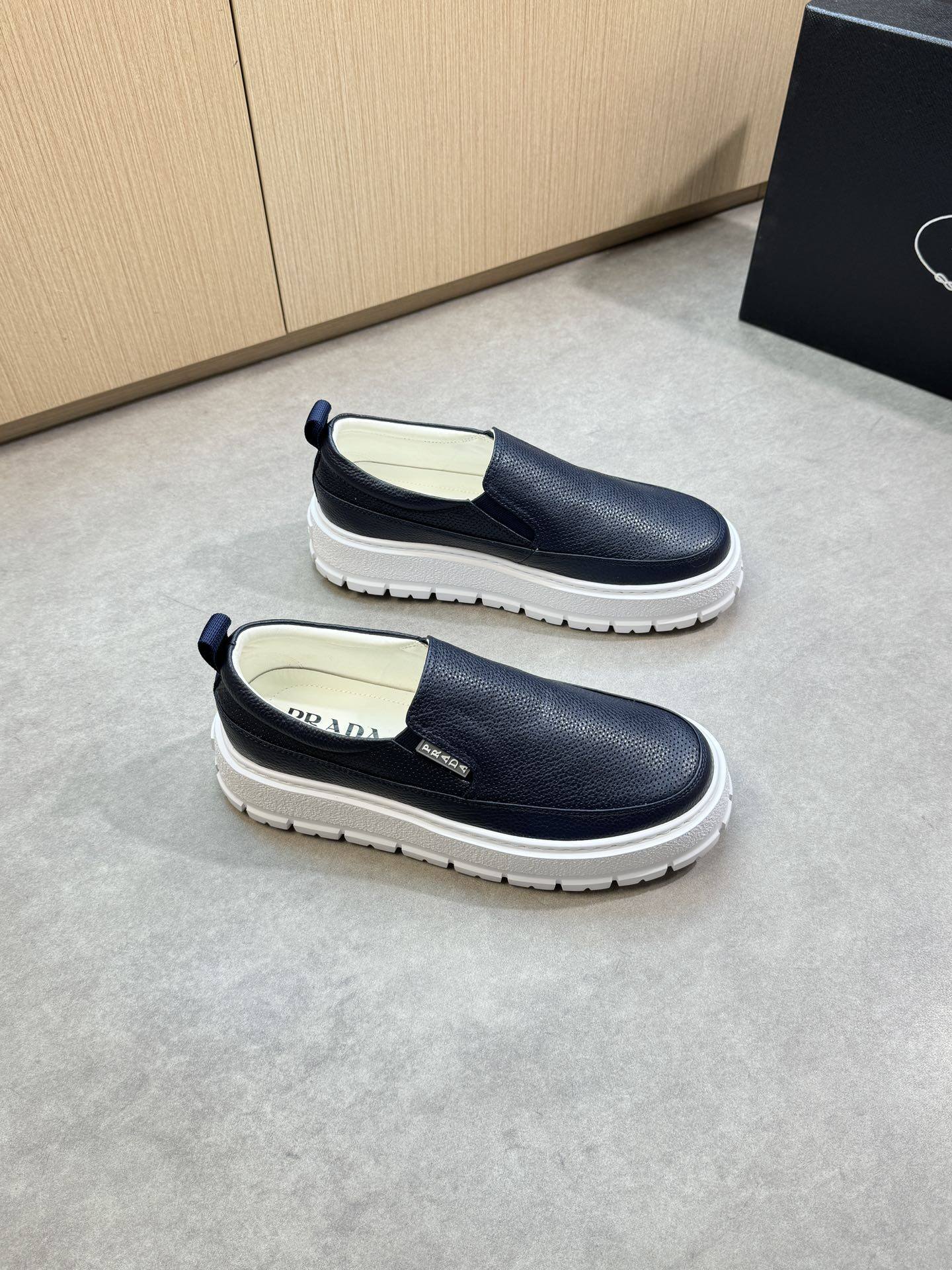 Prada Navy Pebbled Leather Metal Logo Chunky Slip-On Loafers