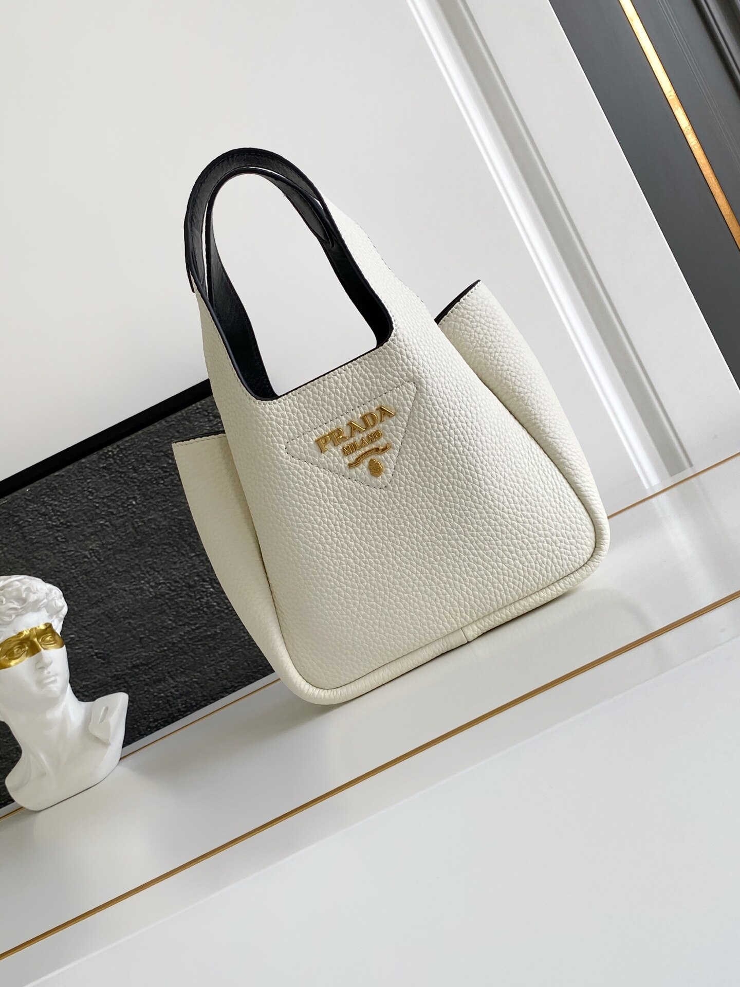 Prada Prada White Pebbled Leather Triangle Logo Mini Tote Handbag