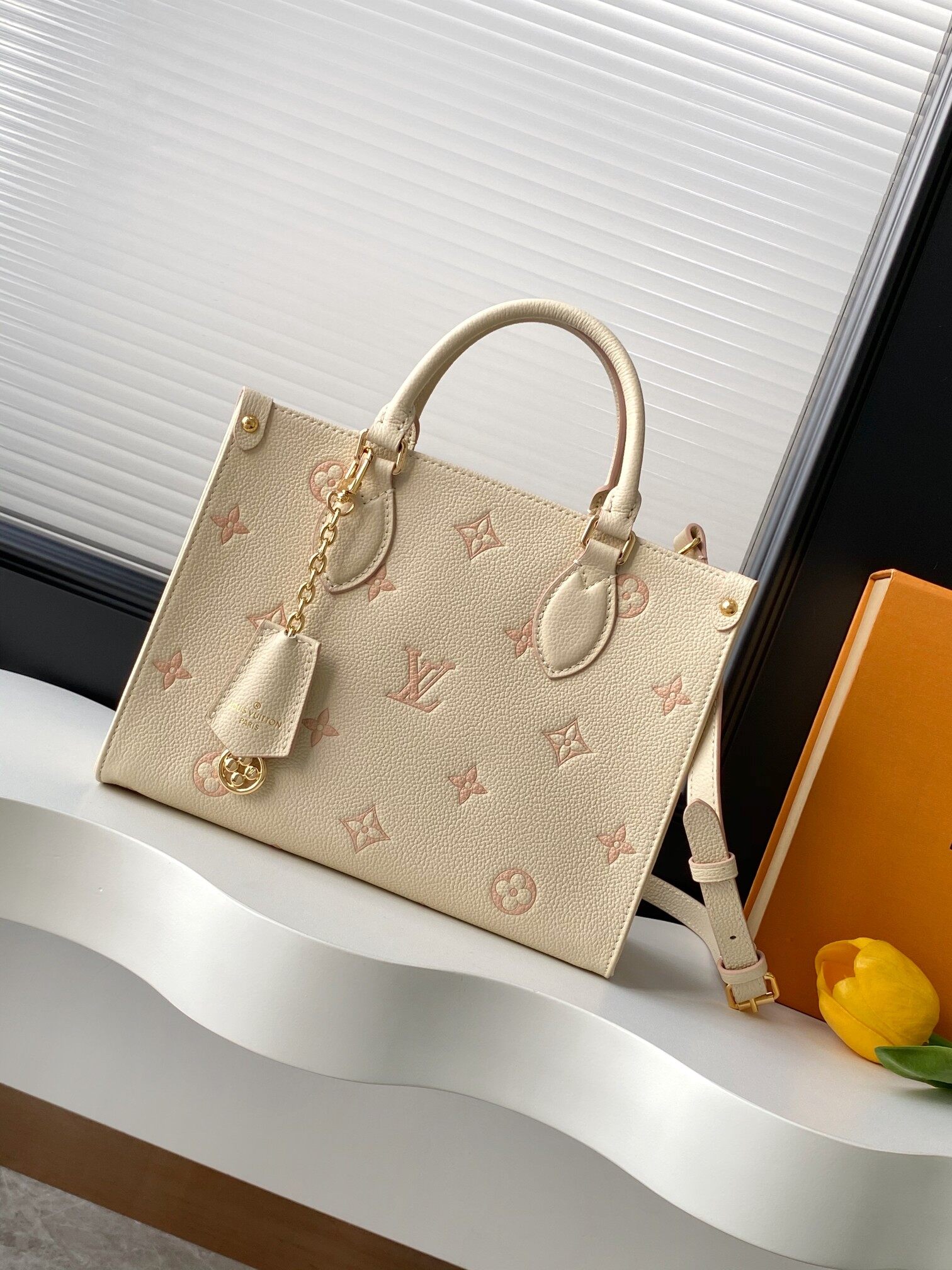  Louis Vuitton Louis Vuitton Cream Pink Embossed Onthego PM Tote Bag