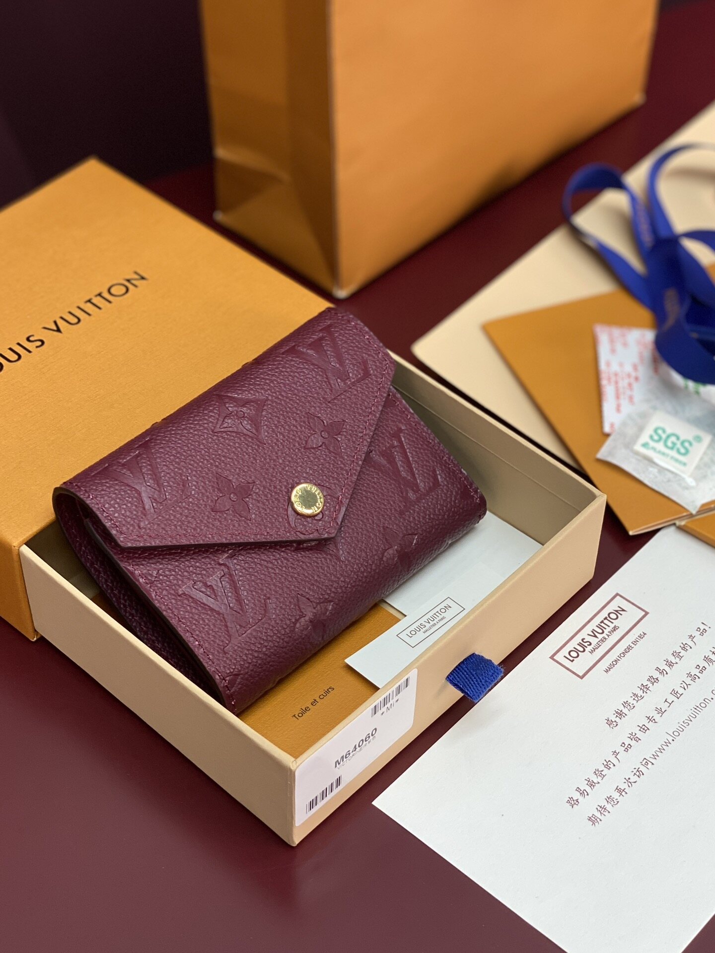 Louis Vuitton LV Burgundy Empreinte Press‑button Short Wallet