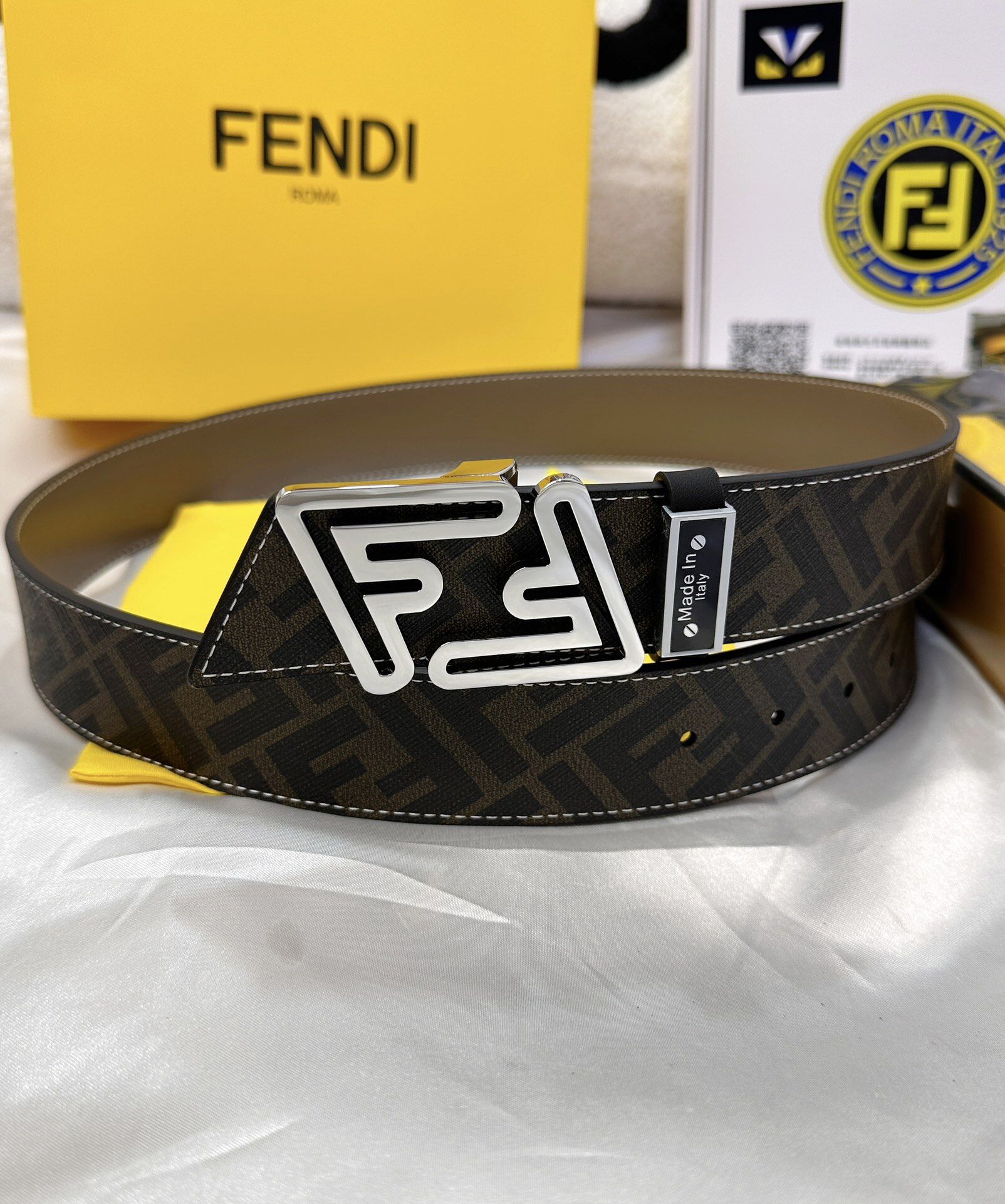 Fendi Fendi FF Monogram Silver Hollow‑Cut Leather Belt