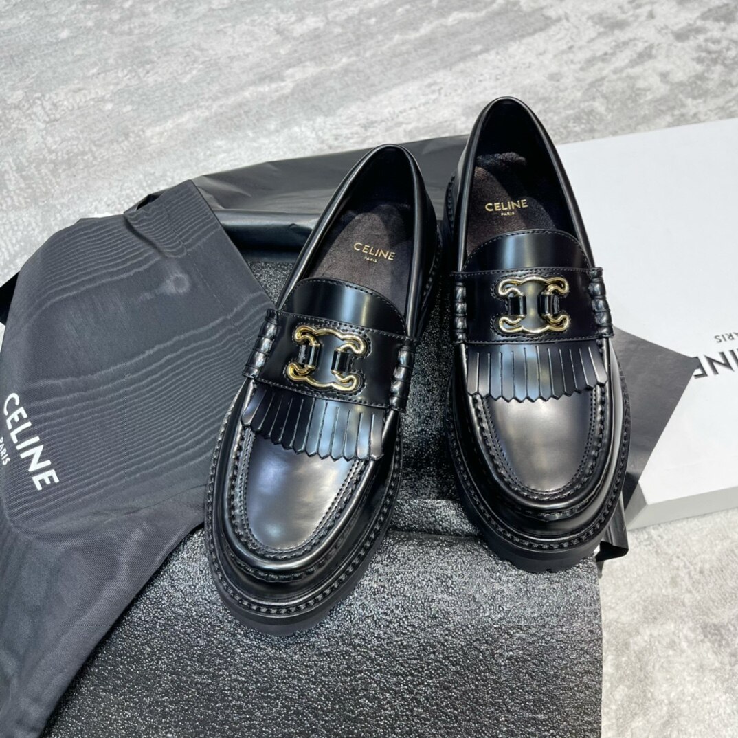 Celine  Black Smooth Leather Triomphe Buckle Fringe Lug Sole Slip-On Loafers