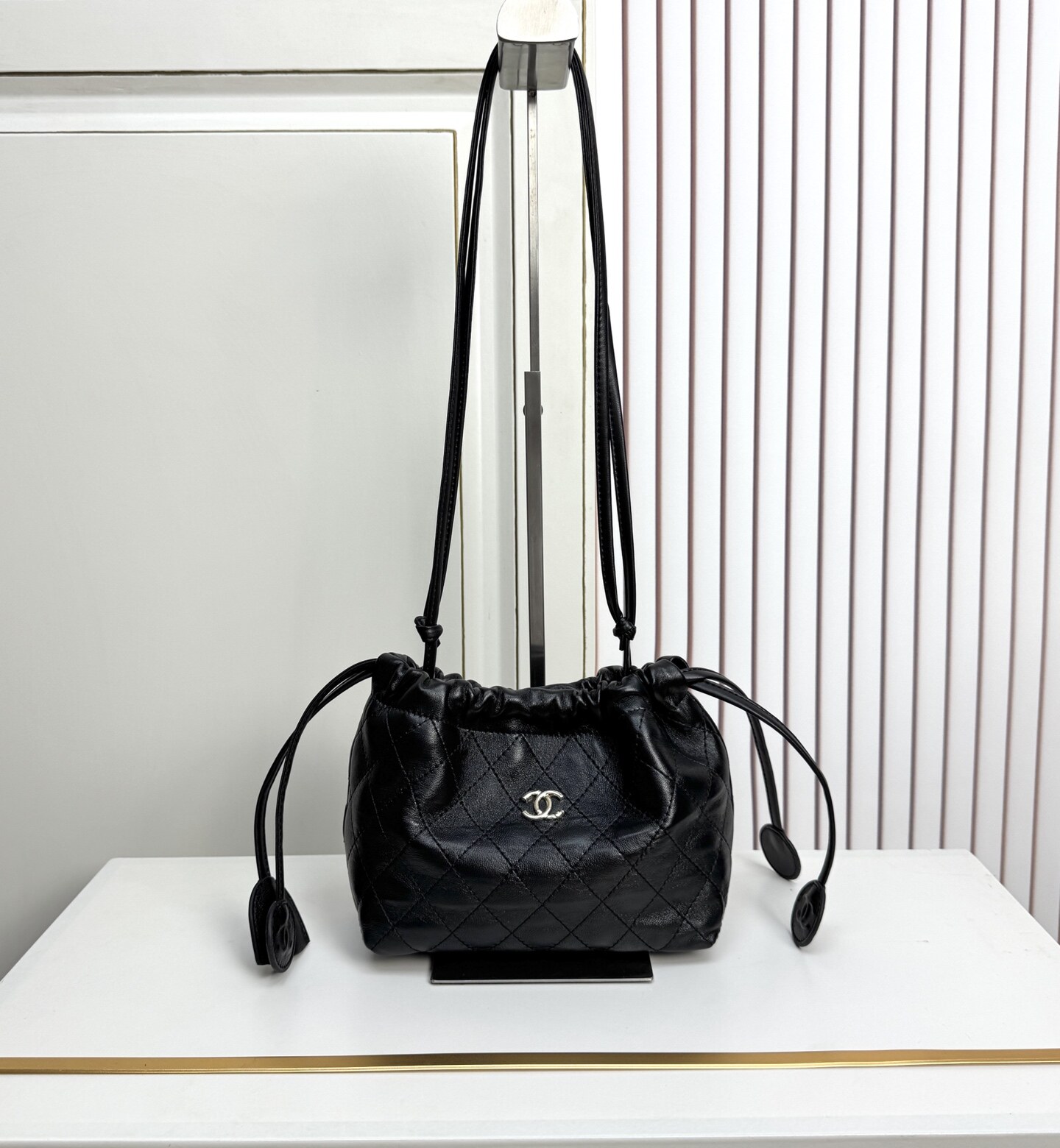 Chanel Chanel Black Quilted Drawstring Mini Bucket Bag