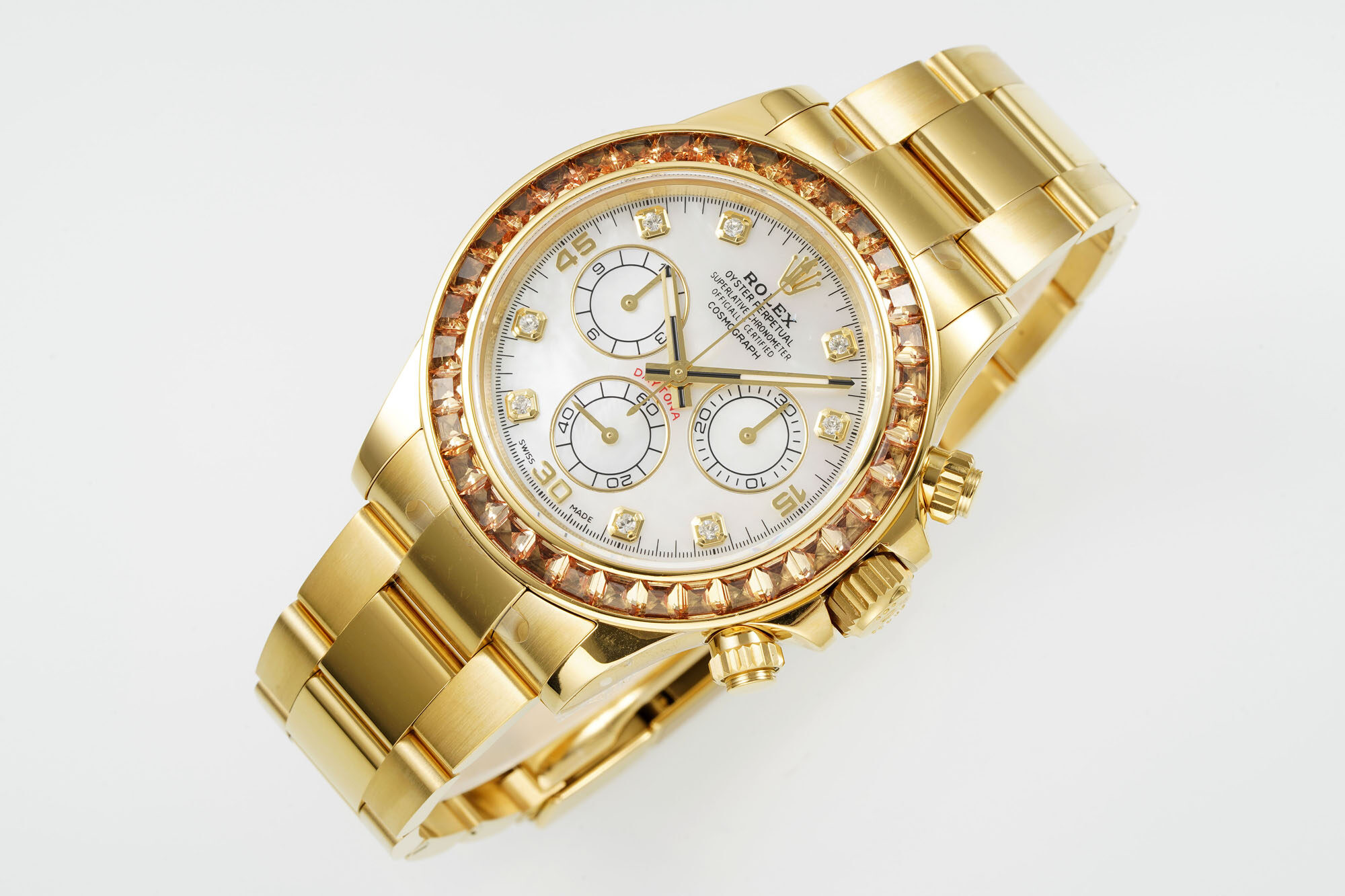 Rolex Rolex Cosmograph Daytona 18K Yellow Gold Orange Gem Bezel White MOP Dial Diamond Markers Oyster Brac