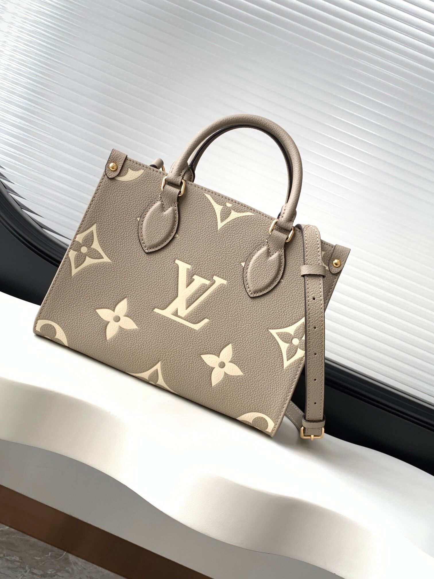  Louis Vuitton Louis Vuitton Grey Cream Embossed Onthego PM Tote Bag