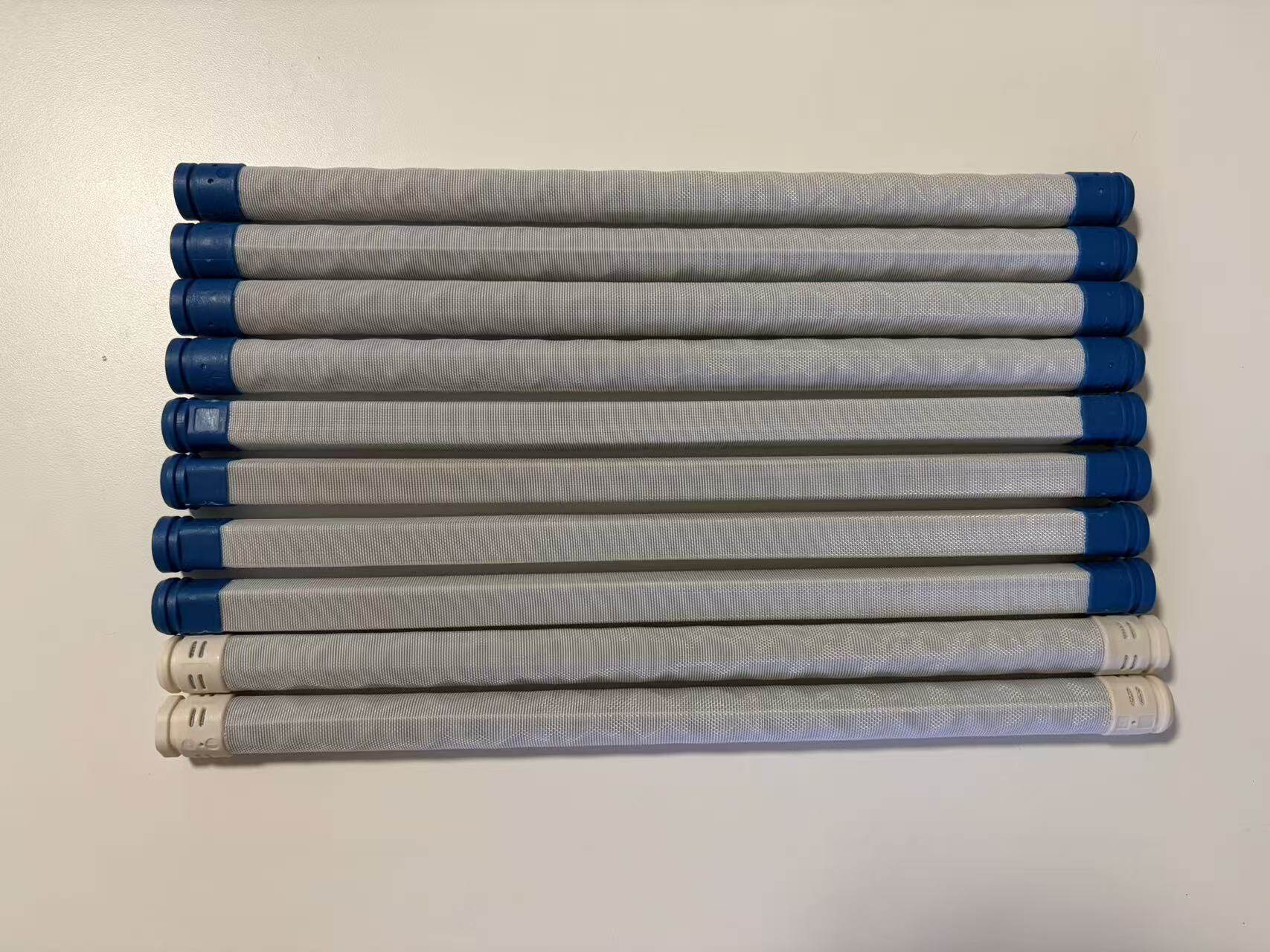 Seamless woven candle filter elements with blue and white end caps