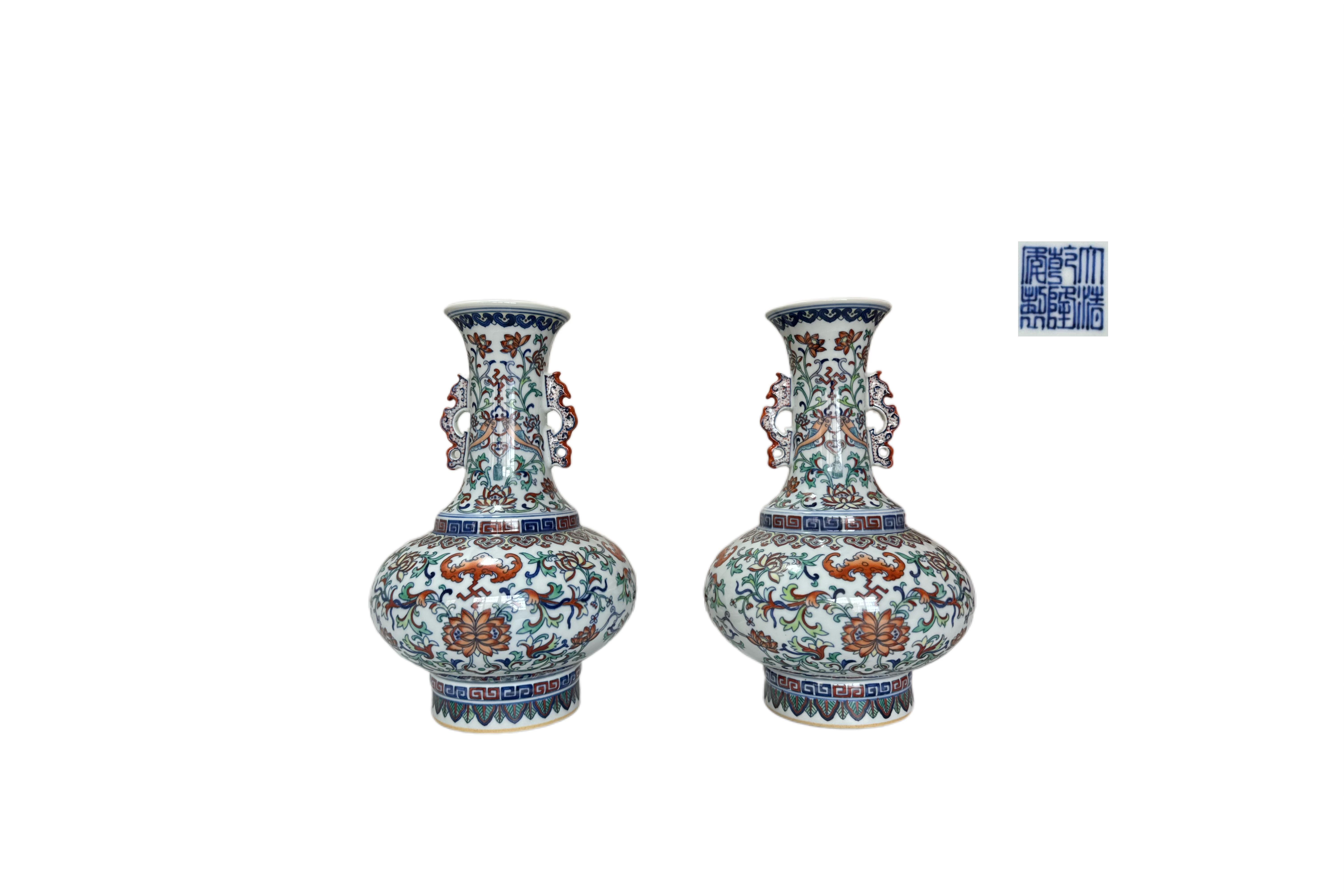 A Pair of Qianlong Period Famille-Rose Vases with Floral Scrolls and Bat Motifs