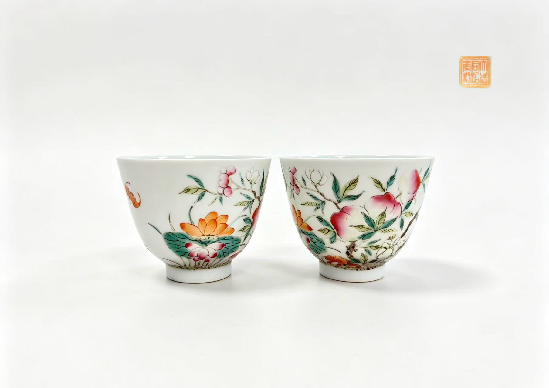 A Pair of Famille Rose Cups with Fruit and Flower Motifs, Marked Tongzhi Reign of the Qing Dynasty