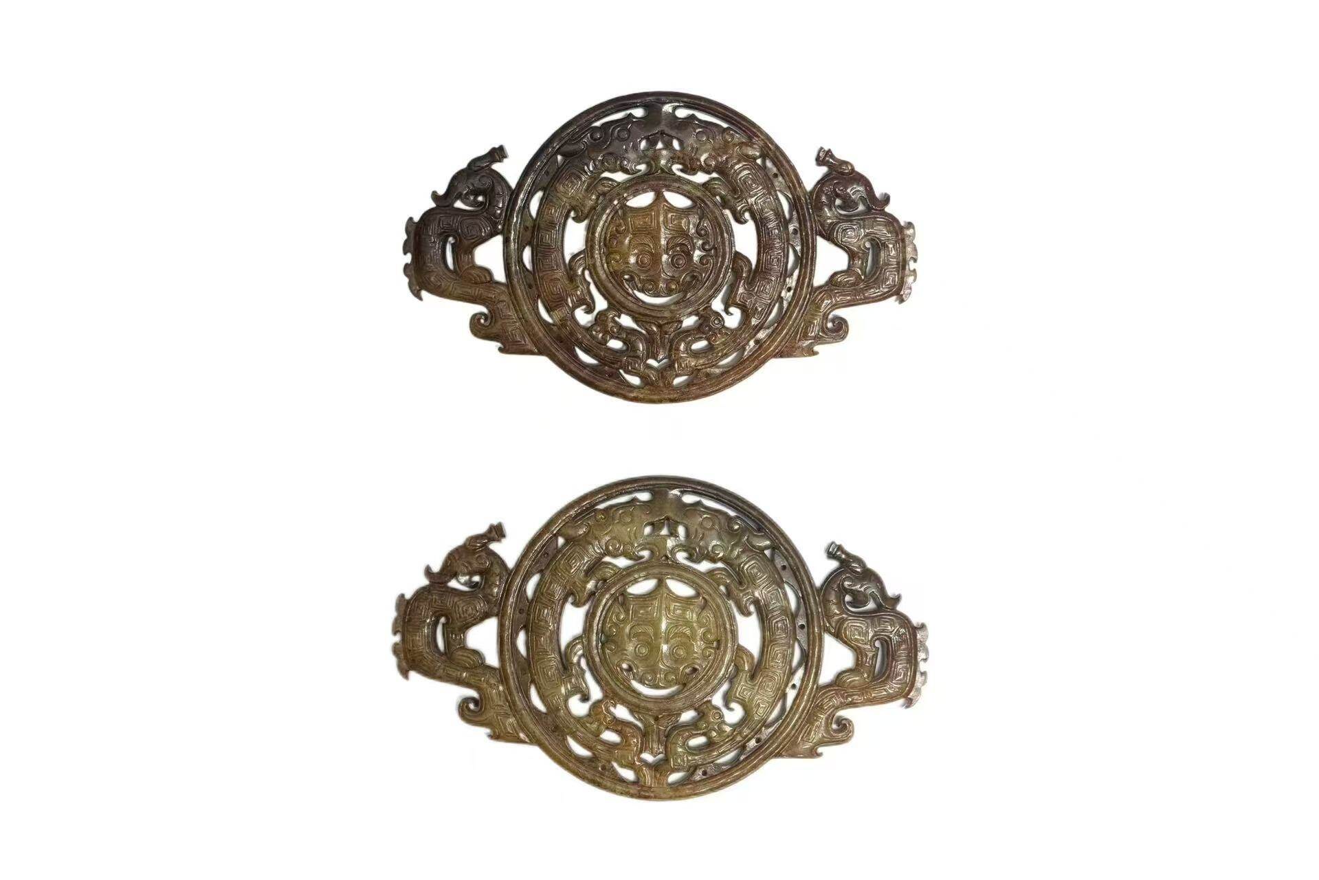 Carved Jade Bi with Two Dragons and a Beast Mask