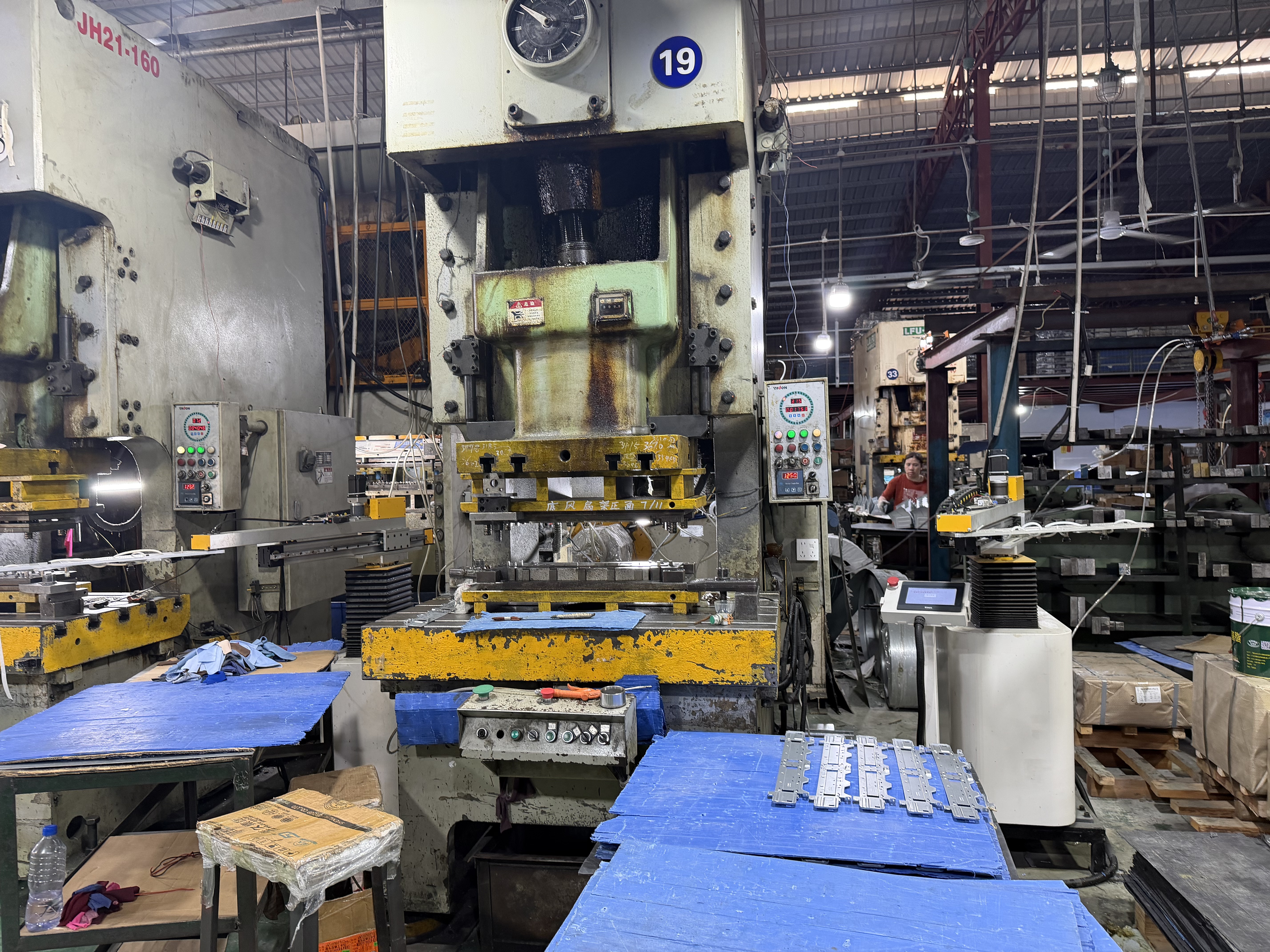 Multi-station stamping automation for a kitchen and bathroom appliance manufacturer