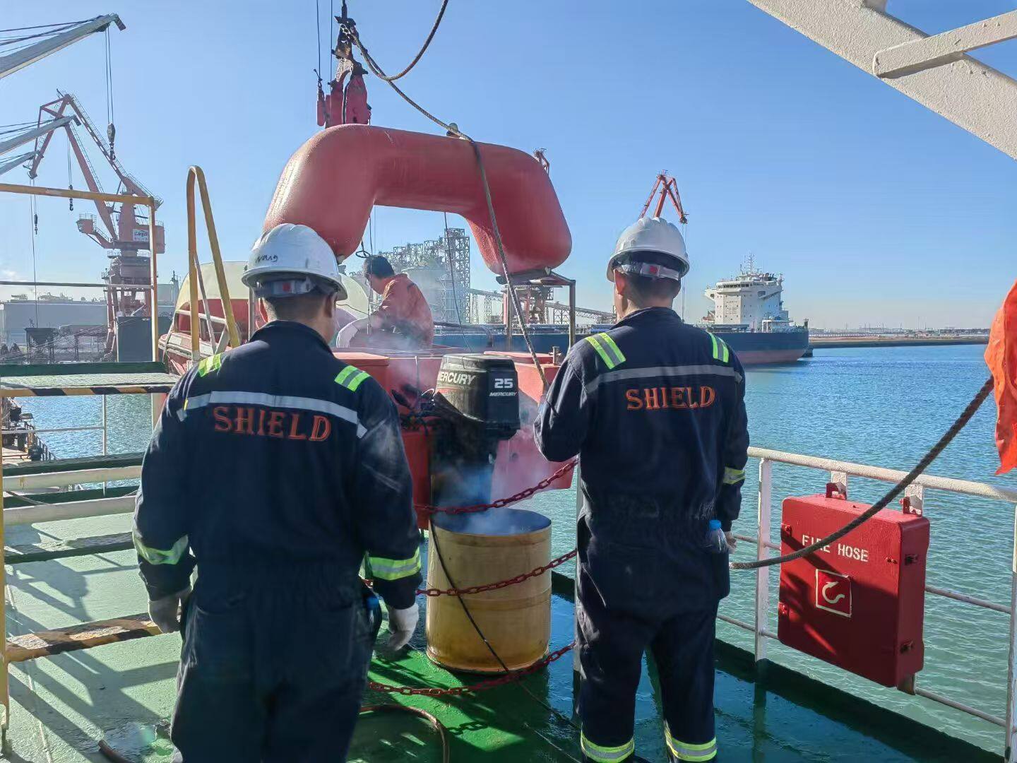 Marine engineer inspecting safety equipment