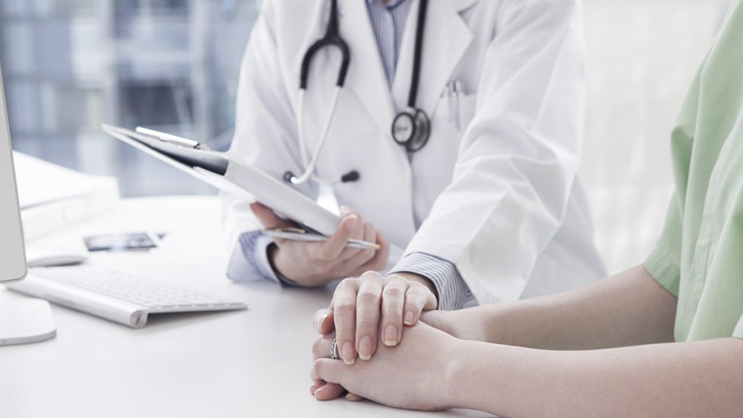 Doctor consulting with patient about skincare treatment