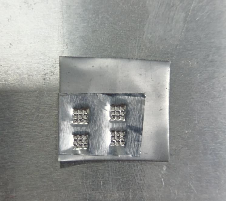 Sample of precision 4-grid metal sheet welding