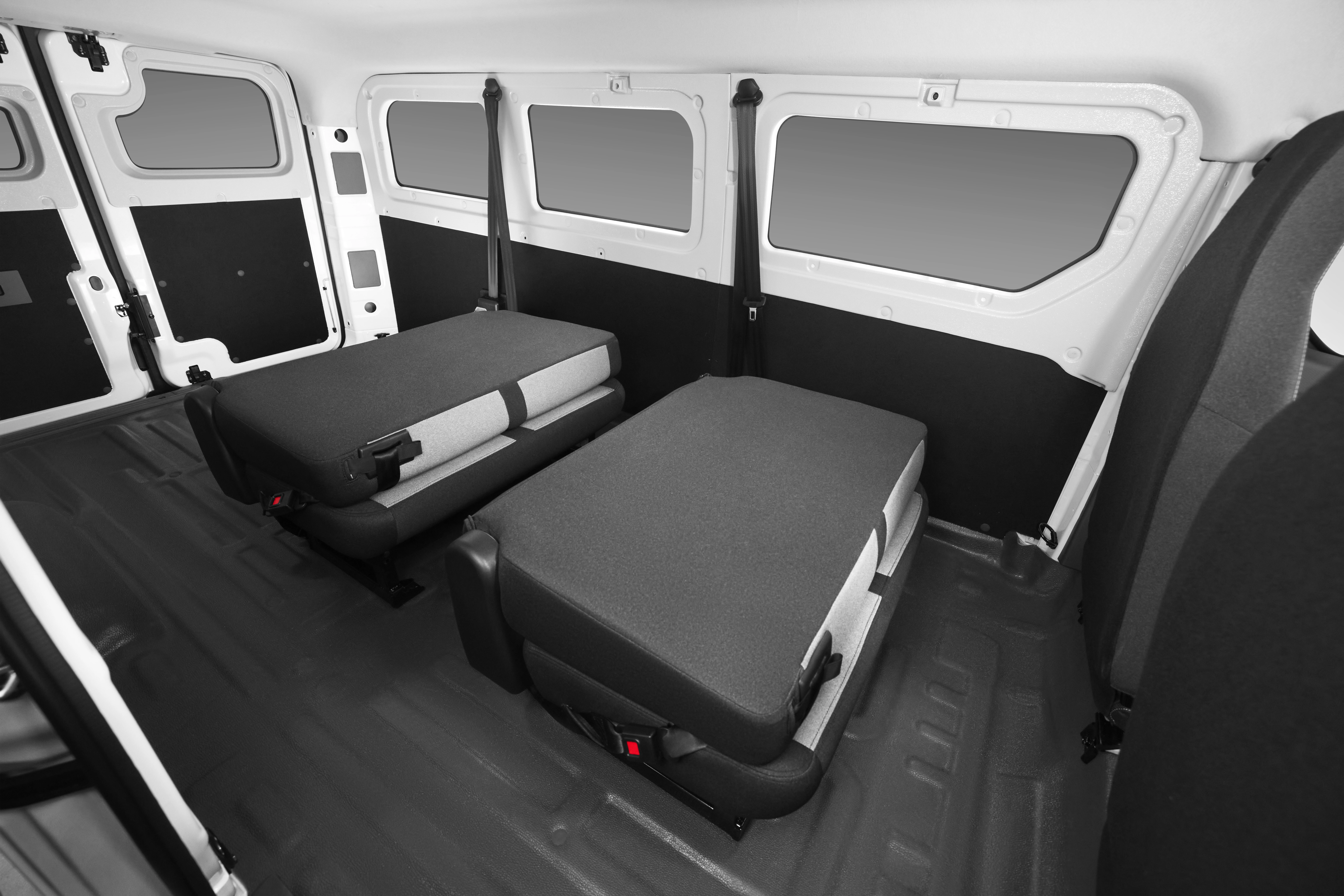 v6e_passenger_interior_rear_seats_folded.webp