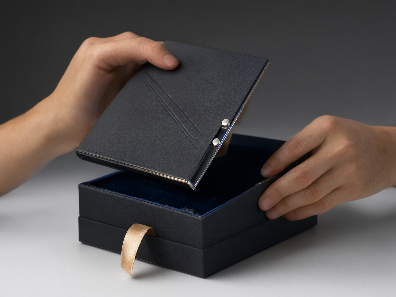 Hands lifting the magnet-closed lid of a rigid perfume box, magnets exposed on the lid return