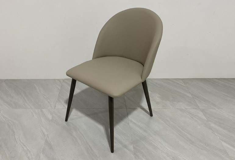 Modern Taupe Upholstered Dining Chair with Sculpted Curved Back and Black Legs