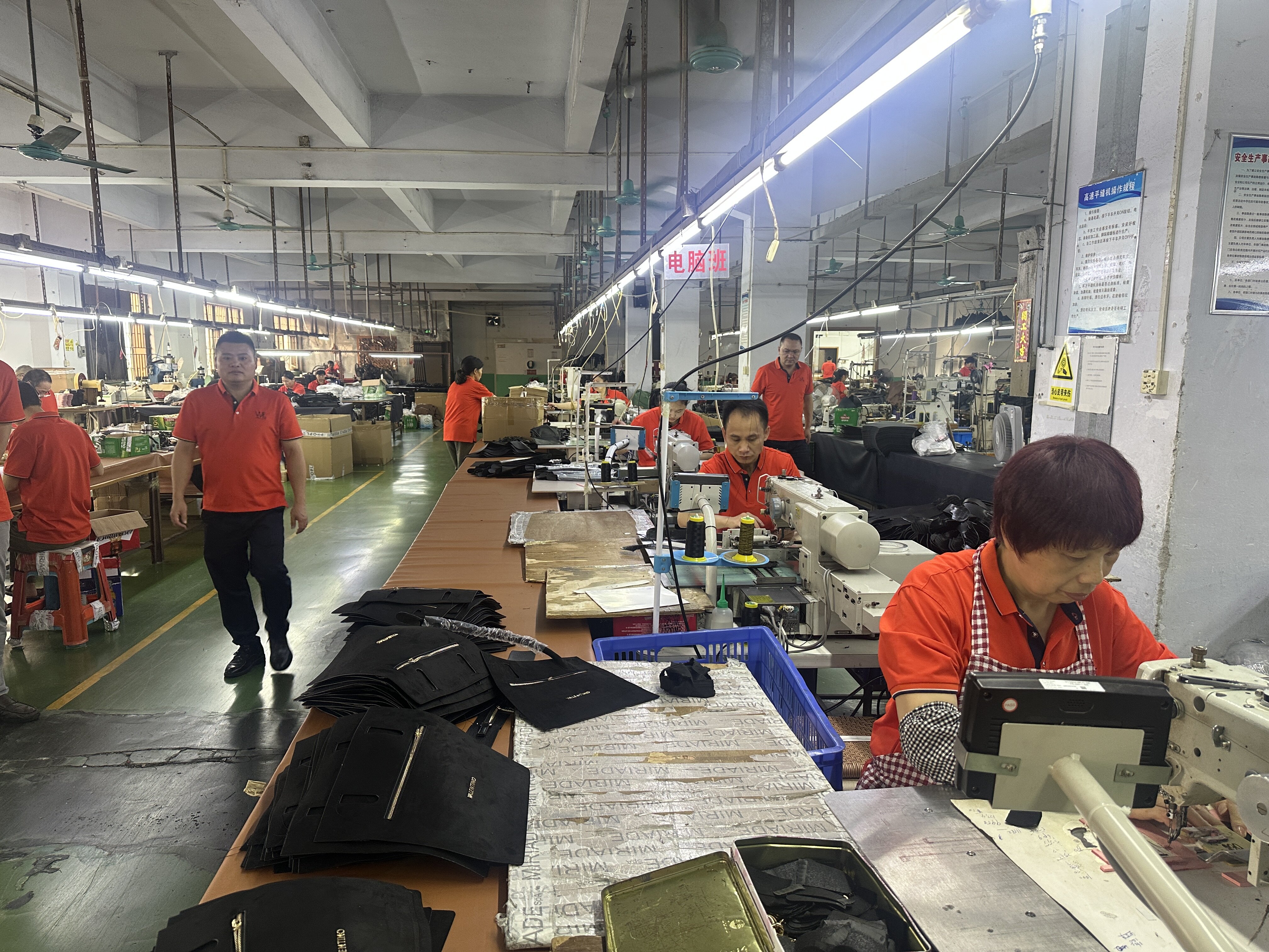 Sewing workshop - production line with skilled workers