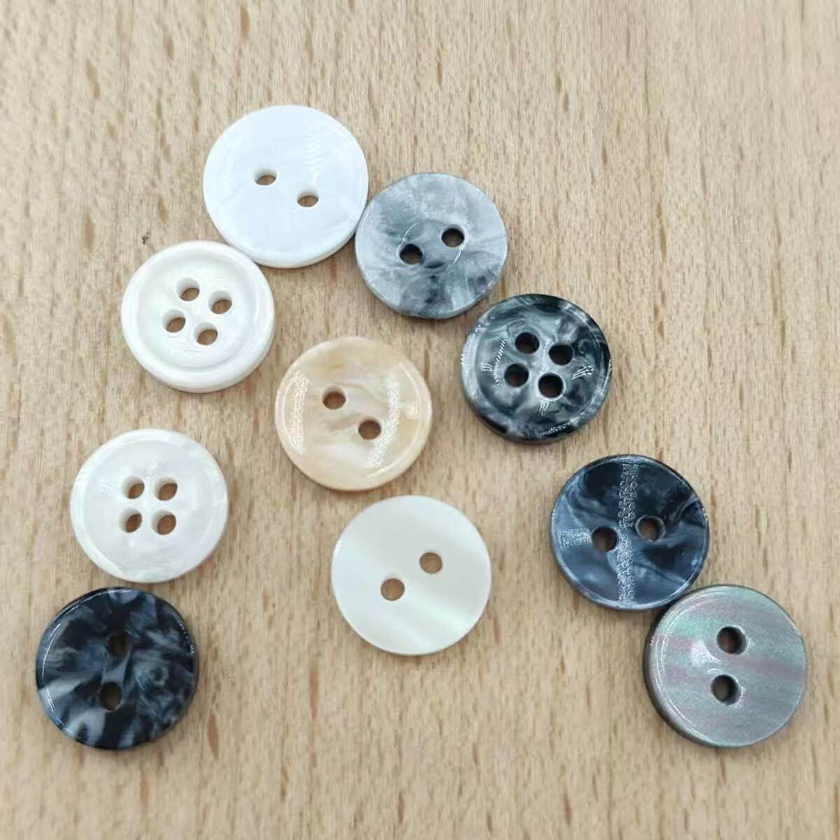 Imitation shell button