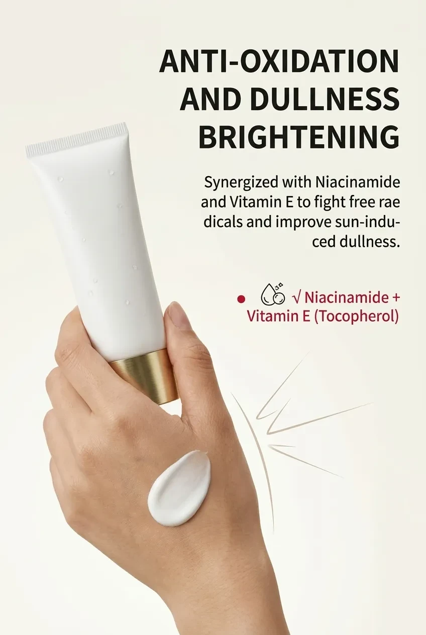 Hand holding the sunscreen tube with a lotion swatch on the back of the hand
