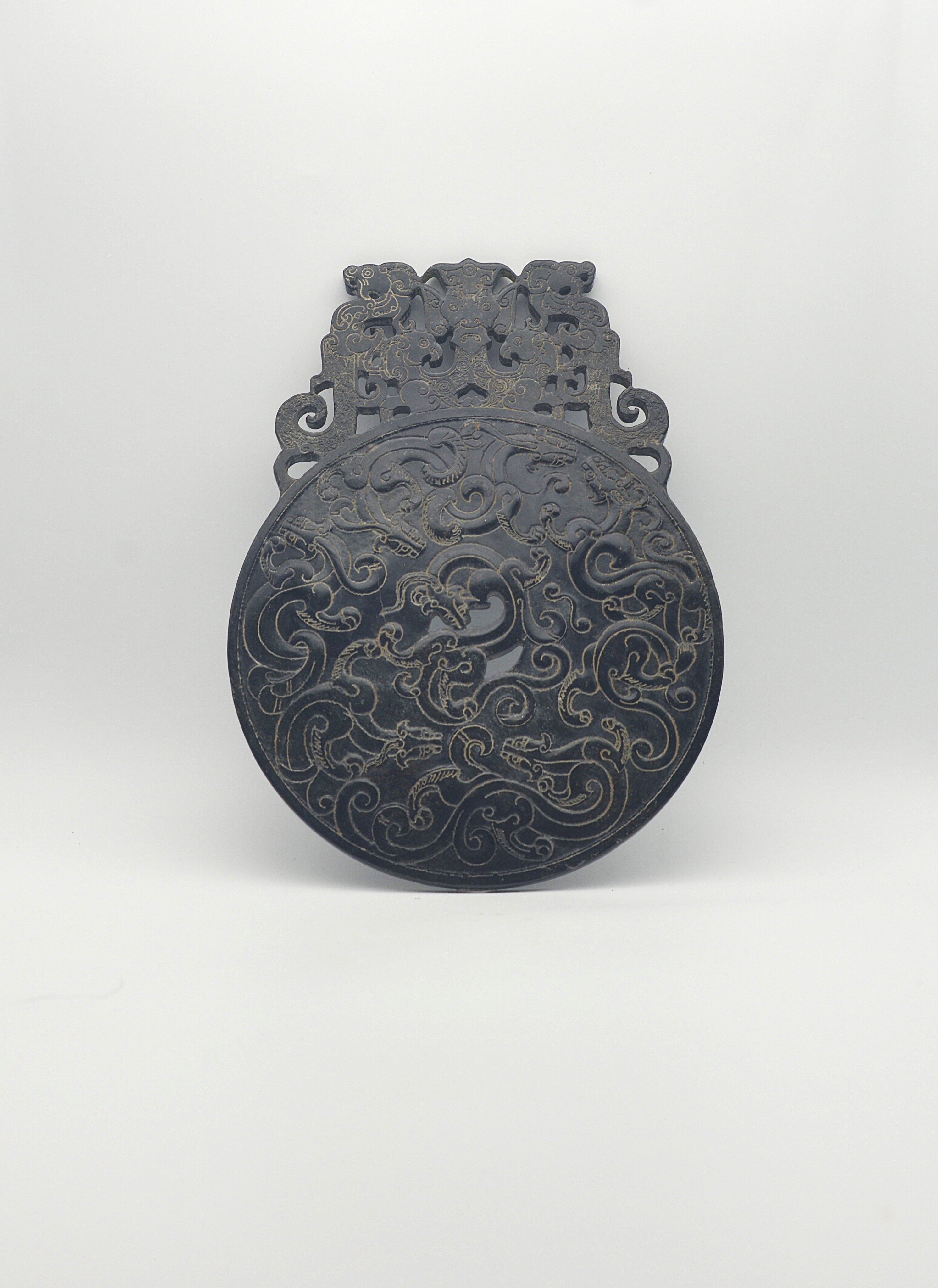Carved Openwork Jade Bi with Dragon, Phoenix, and Chi-Dragon Motifs 20.5×15×{2.7 cm}
